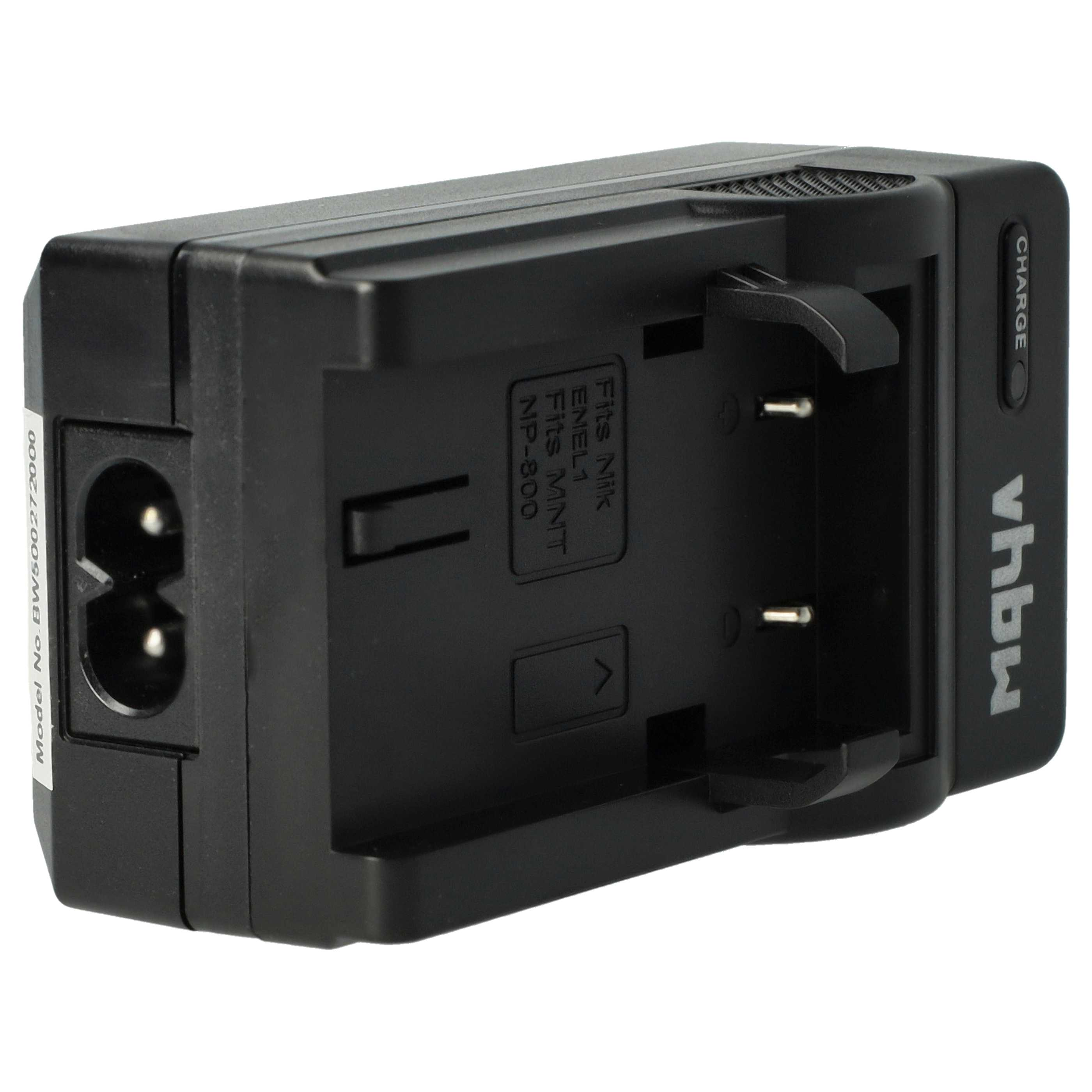 Schwarzes Batterieladegerät mit Stiften, einem Stromeingang und dem Text 'CHARGE'. Modell-Nr. BW600272000.