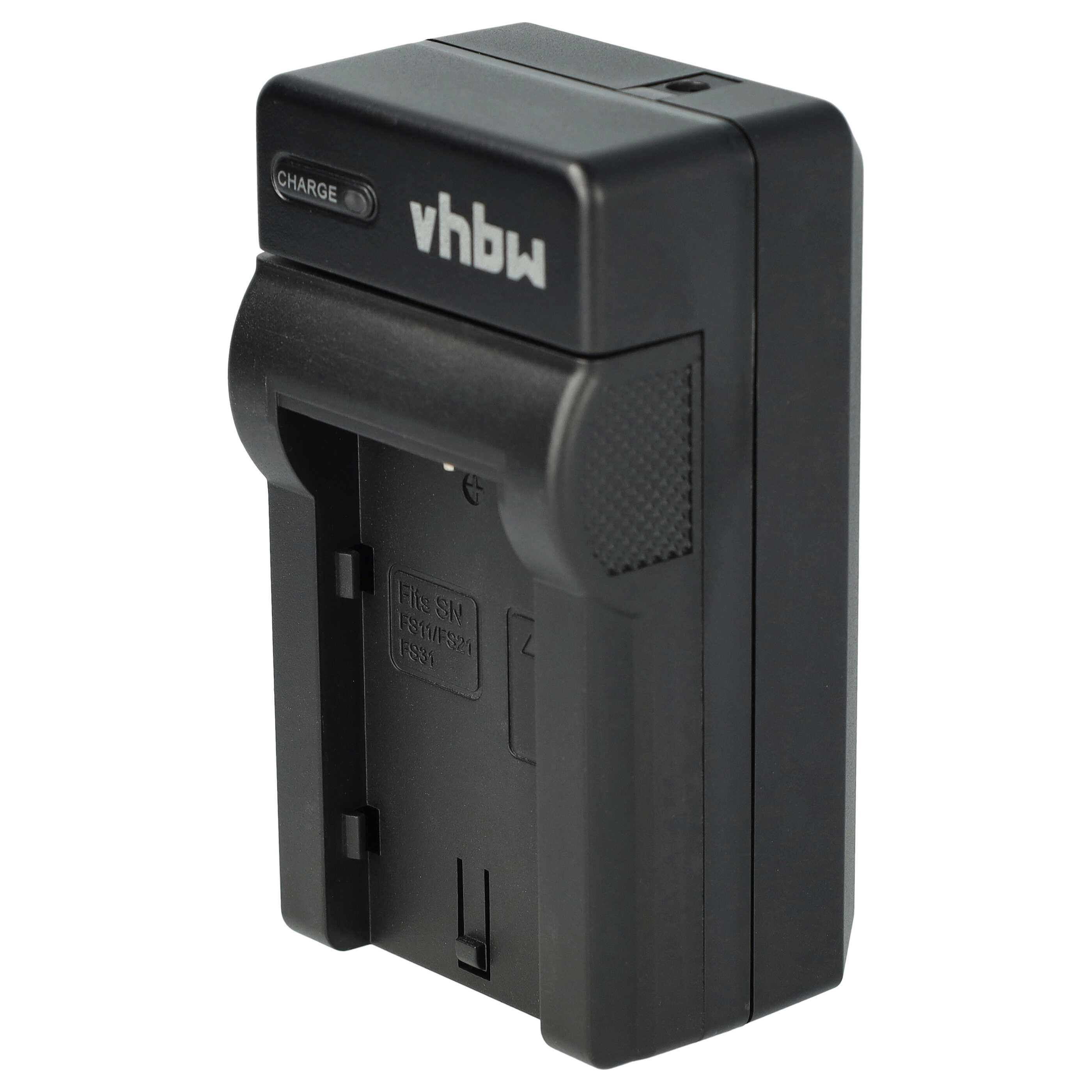 Ein schwarzes vhbw-Batterieladegerät wird gezeigt. Es hat eine 'CHARGE'-Anzeige und einen Schlitz zum Einsetzen der Batterie. Der Hintergrund ist weiß.