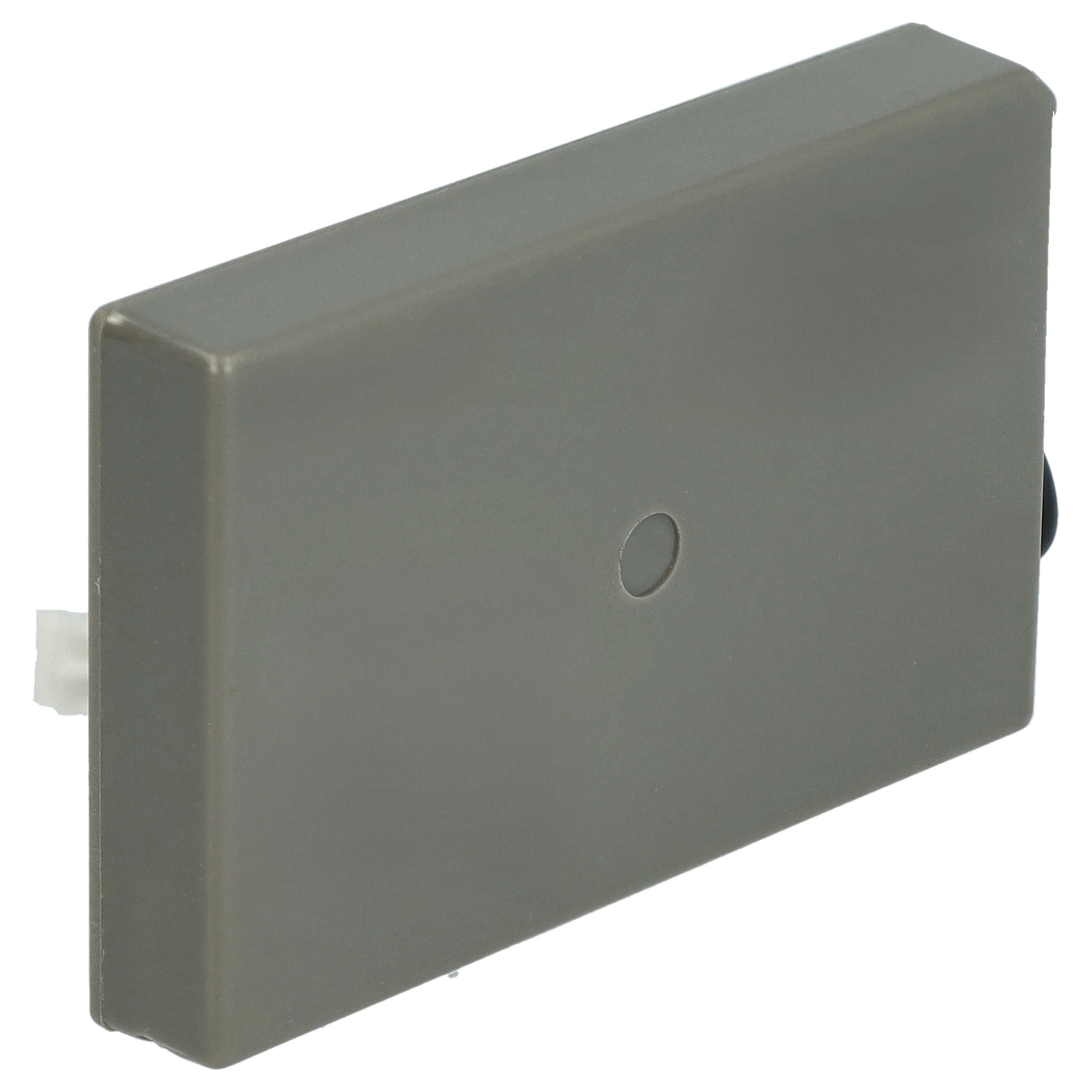 Ein rechteckiges, graues elektrisches Bauteil mit einem kleinen Loch und einem weißen Stecker auf weißem Hintergrund.