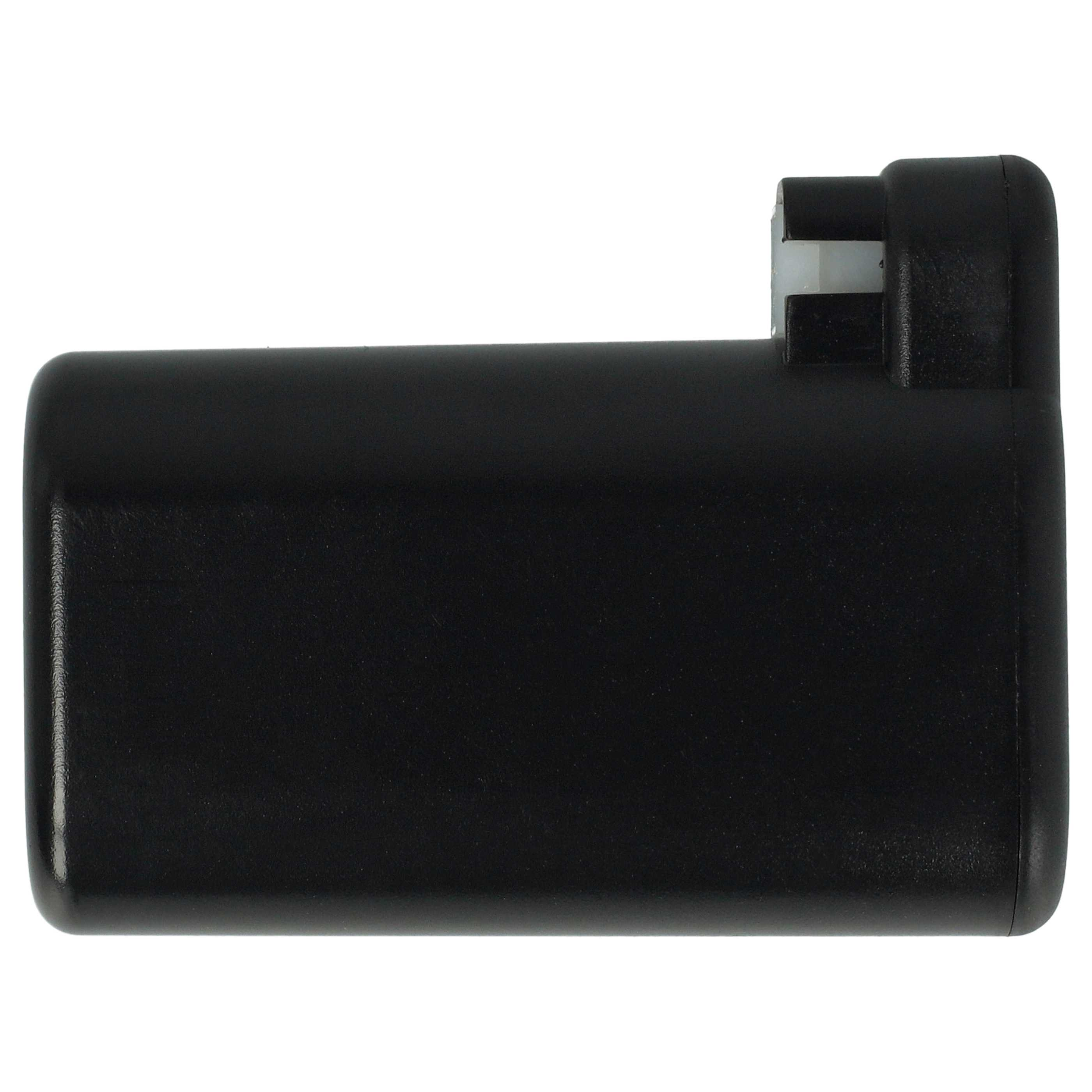 Ein schwarzes, rechteckiges Objekt mit einem weißen Stecker oben. Es ist vor weißem Hintergrund.