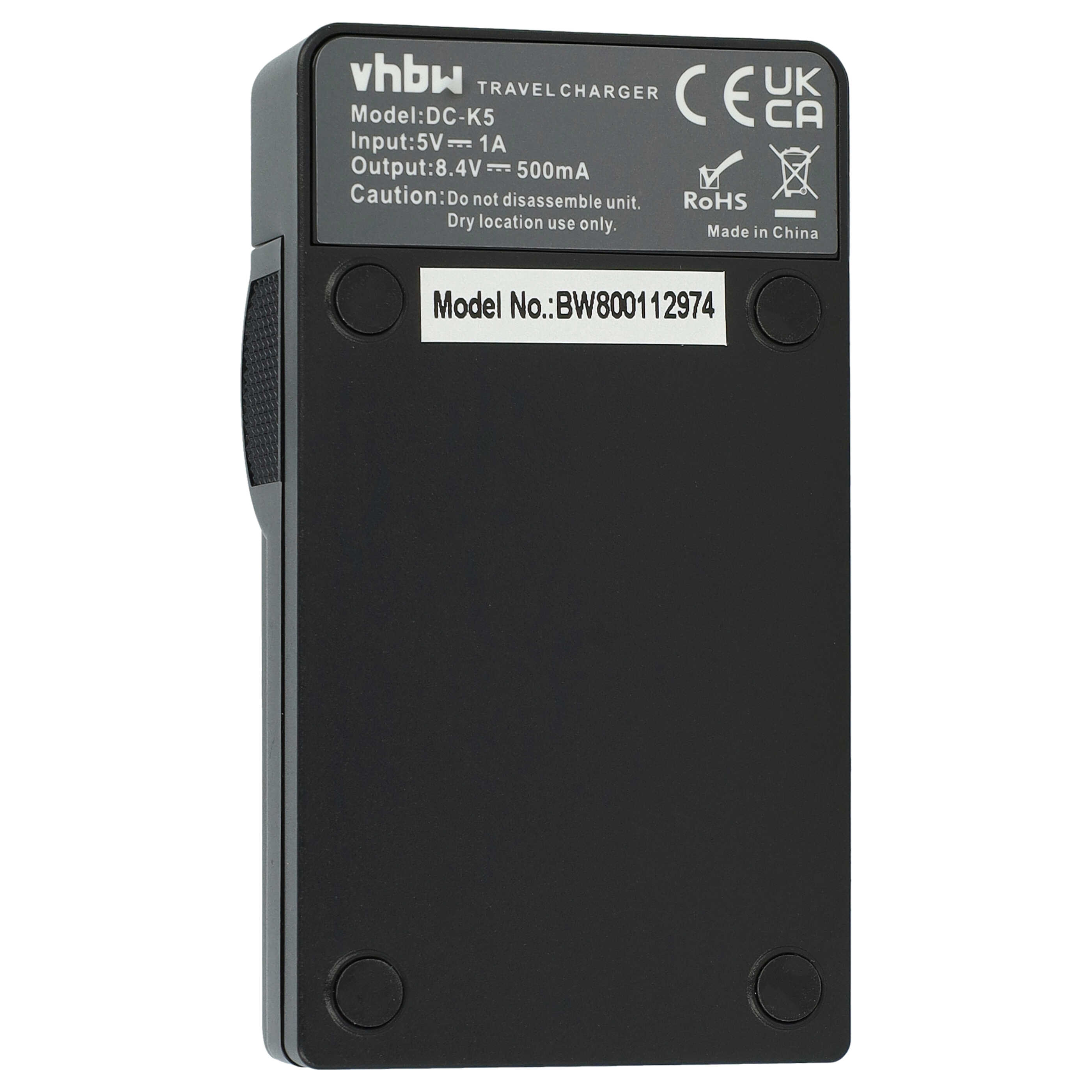 Ein schwarzes Reisegerät mit Text: vhbw, Modell: DC-K5, Eingang: 5V 1A, Ausgang: 8,4V 500mA, Modell-Nr.: BW800112974.
