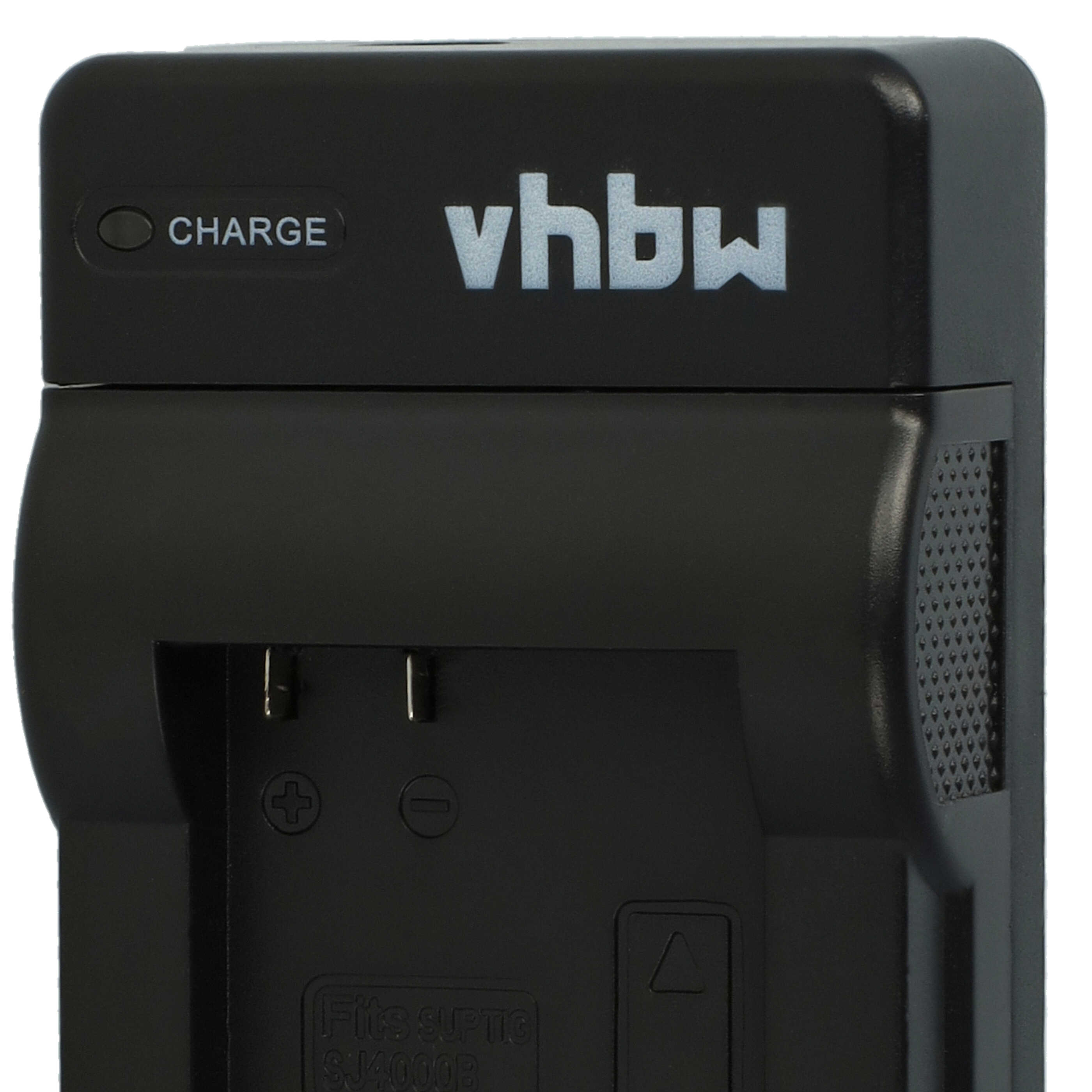 Schwarzes Batterieladegerät mit 'vbhw'-Logo und Text 'CHARGE'. Es hat eine Ladeanzeige und Steckplätze für Batterien.