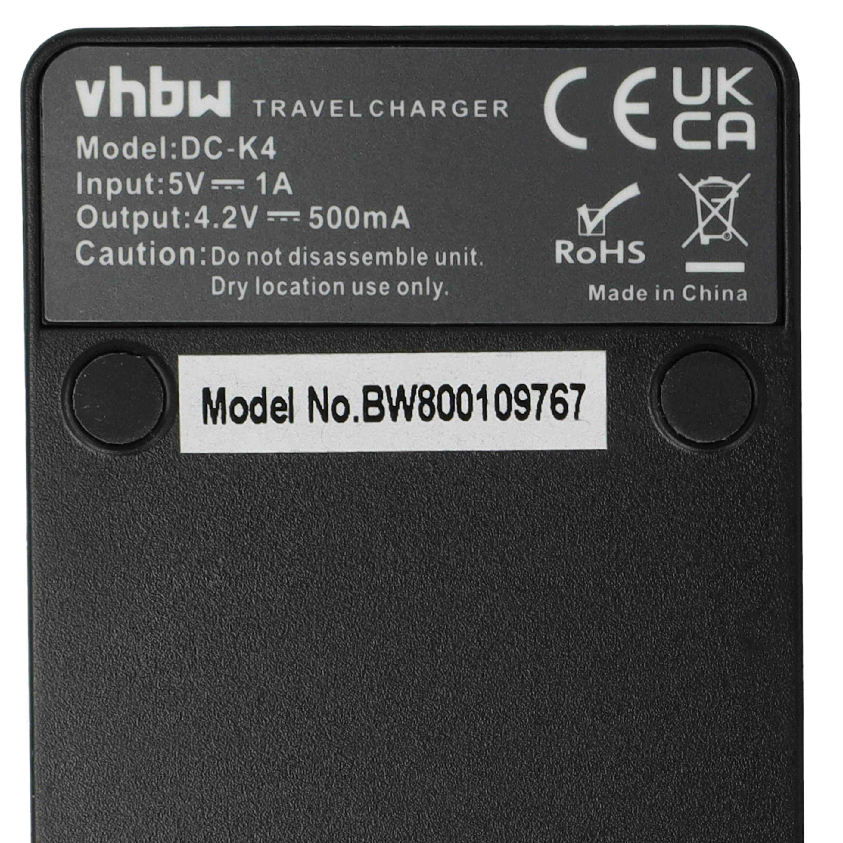 Schwarzes Ladegerät mit weißem Text: 'vhbw TRAVEL CHARGER', Modell DC-K4, Eingang 5V=1A. Achtung: Nicht zerlegen.