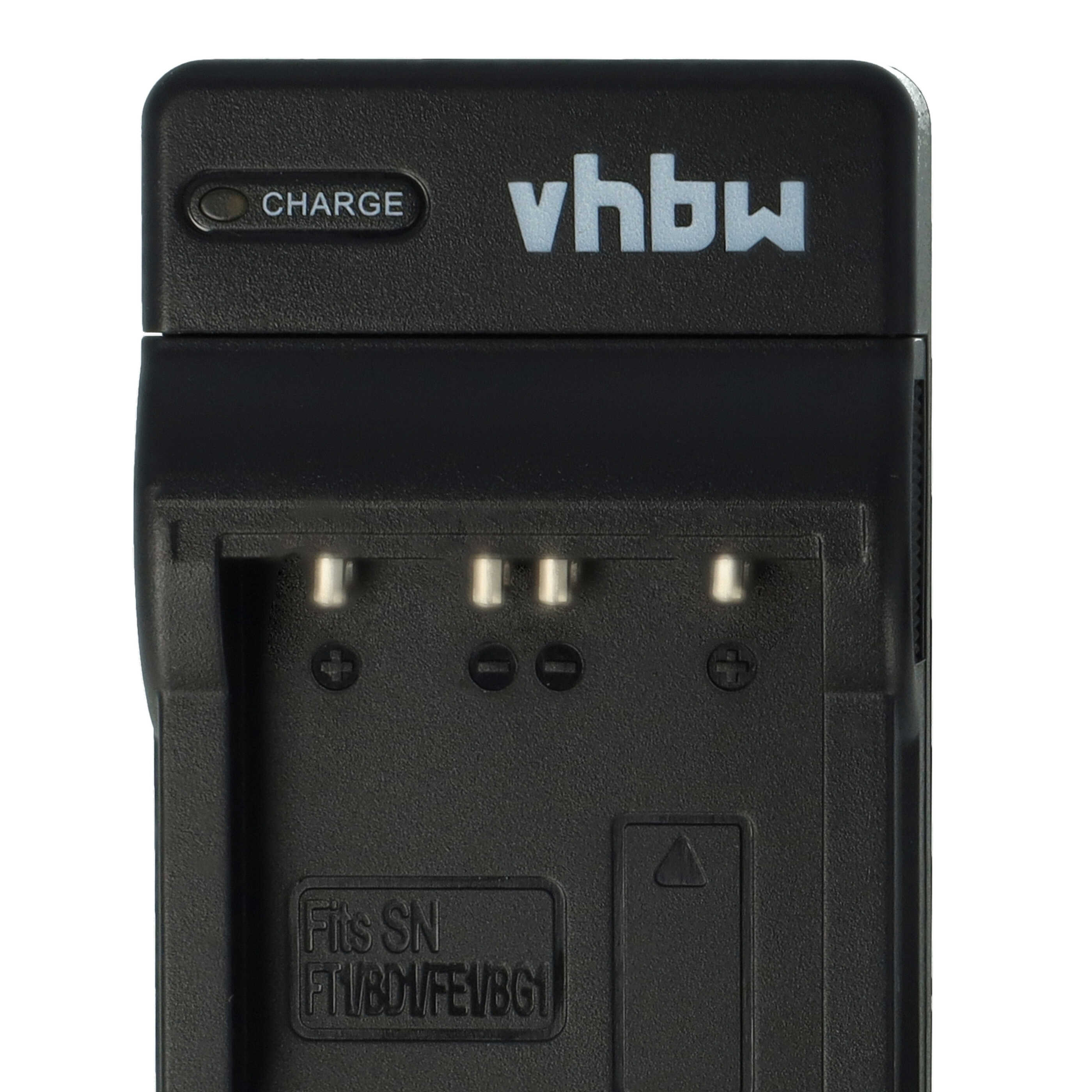 Schwarzes Batterieladegerät mit 'vhbw'-Logo, 'CHARGE'-Anzeige und Anschlussstiften, isoliert auf weißem Hintergrund.