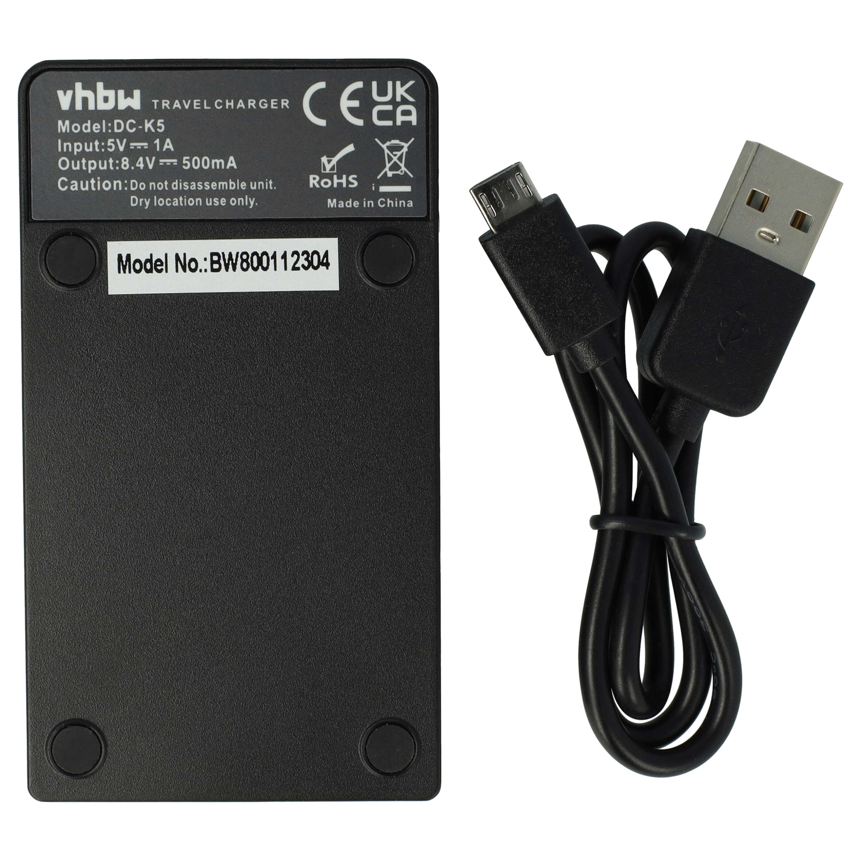 Schwarzes Ladegerät mit USB-Kabel. Ladegerät hat Text und Symbole. Das Kabel ist schwarz und aufgerollt.