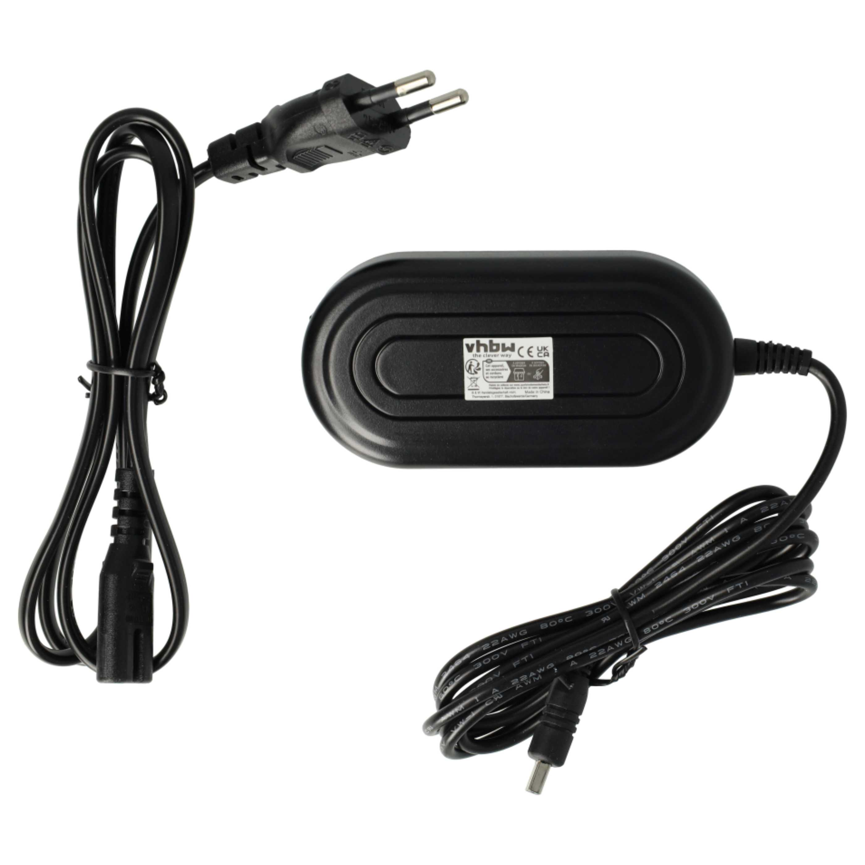 Ein schwarzes Netzteil mit zwei Kabeln. Ein Kabel hat einen Stecker, das andere einen kleinen Anschluss.