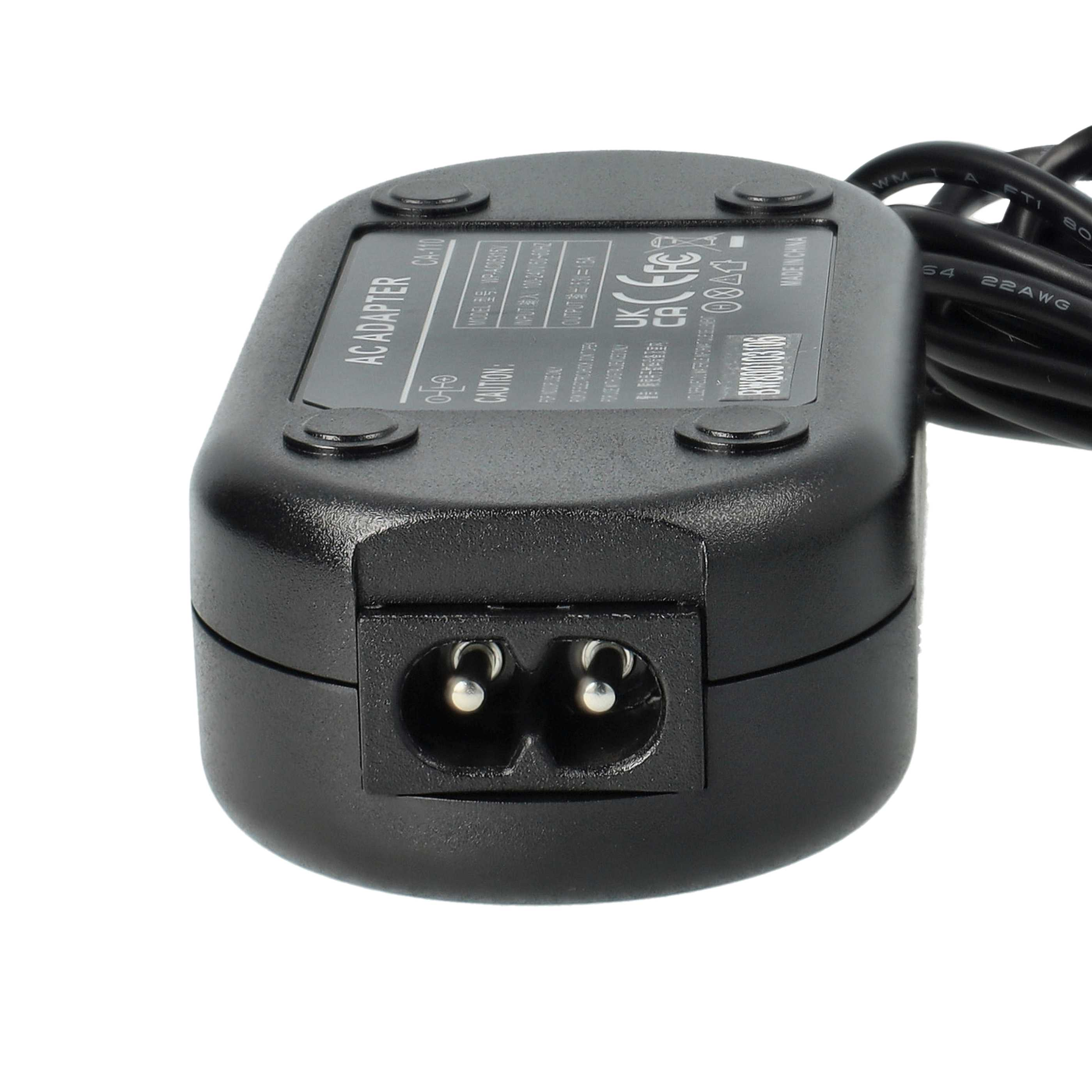 Ein schwarzes AC-Adapter mit Zweizack-Eingang. Es hat Etiketten und ein Netzkabel.