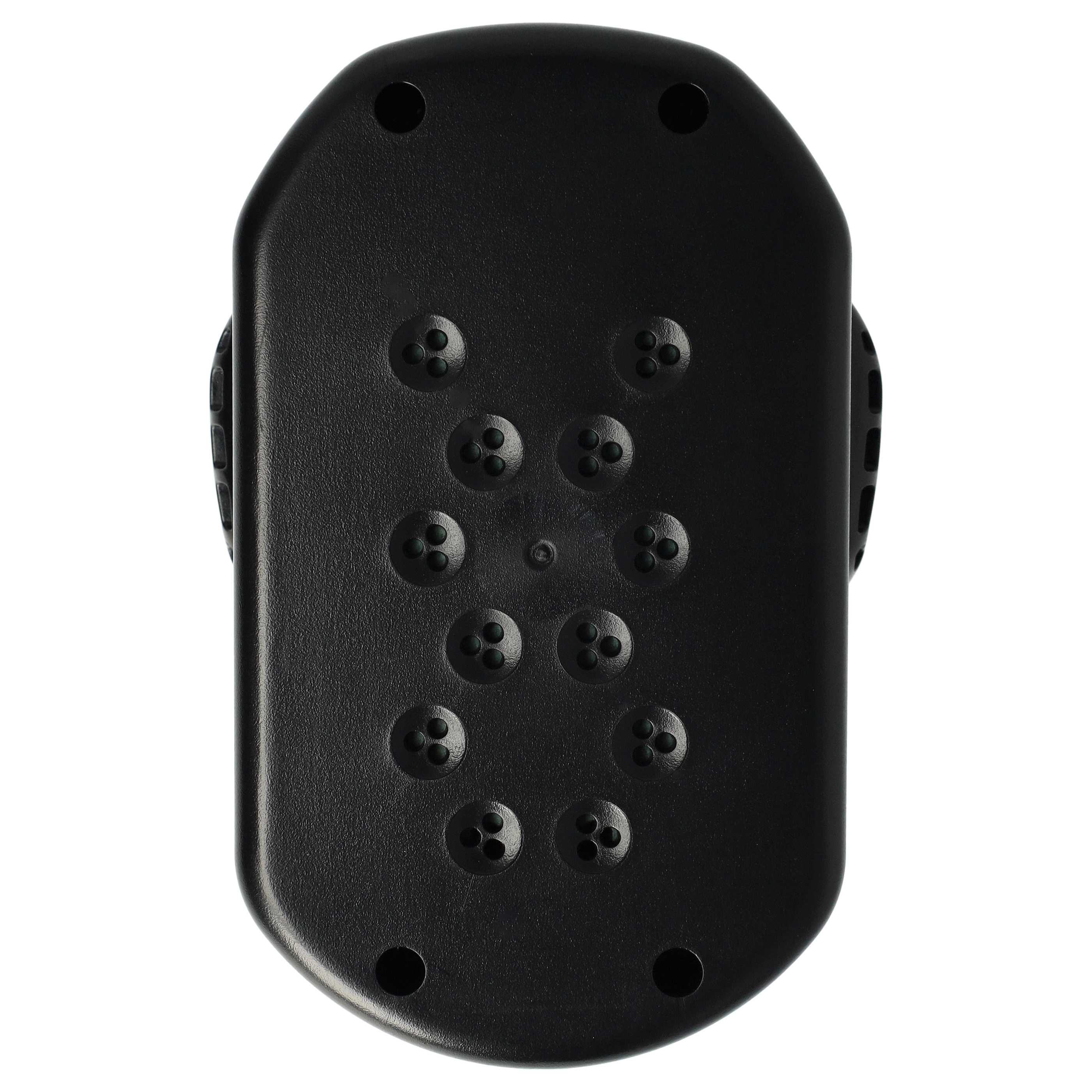Ein schwarzes, oval geformtes Objekt mit mehreren kleinen, runden, vertieften Bereichen. Der Hintergrund ist weiß.