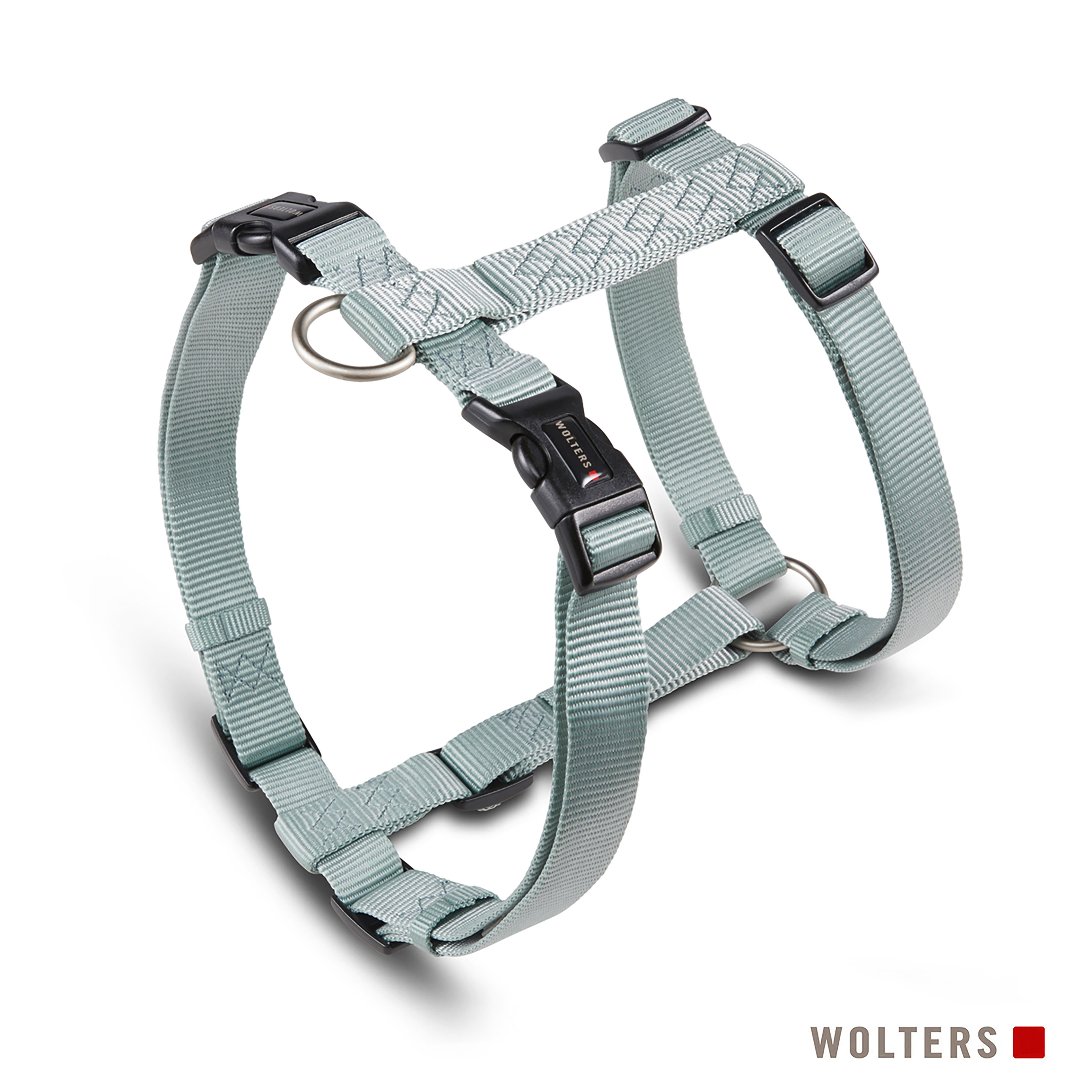 Hellblaues Hundegeschirr mit schwarzen Schnallen und Metallringen. Die Marke 'Wolters' ist auf der Schnalle aufgedruckt.