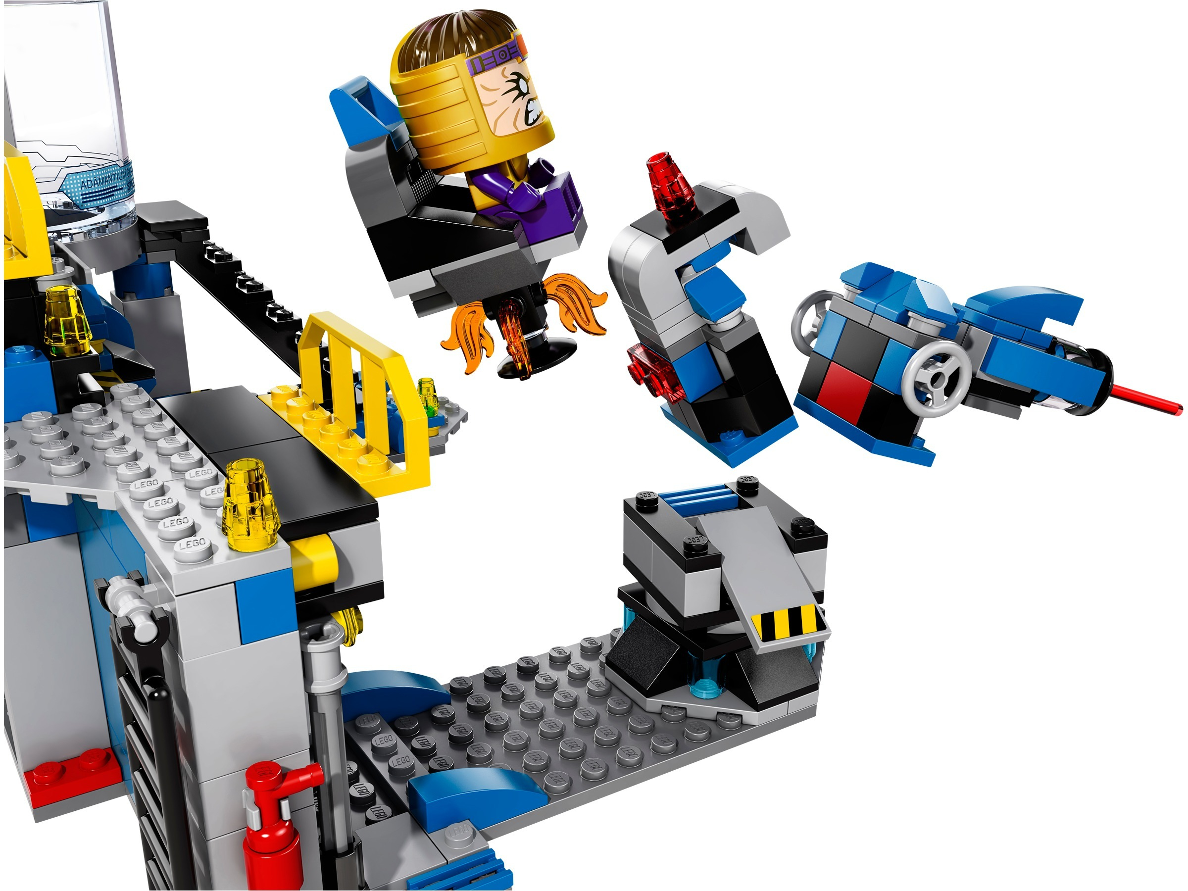 Set Lego con diversi componenti, tra cui un personaggio con la testa gialla, un veicolo e un edificio.