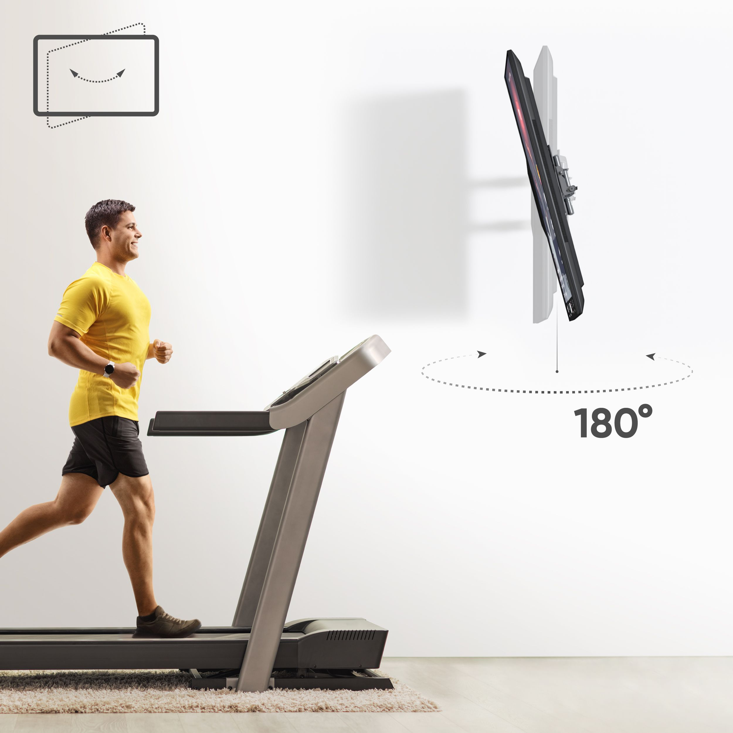 Mężczyzna biega na bieżni. Telewizor zamontowany na ścianie jest pokazany z symbolem obrotu o 180 stopni.