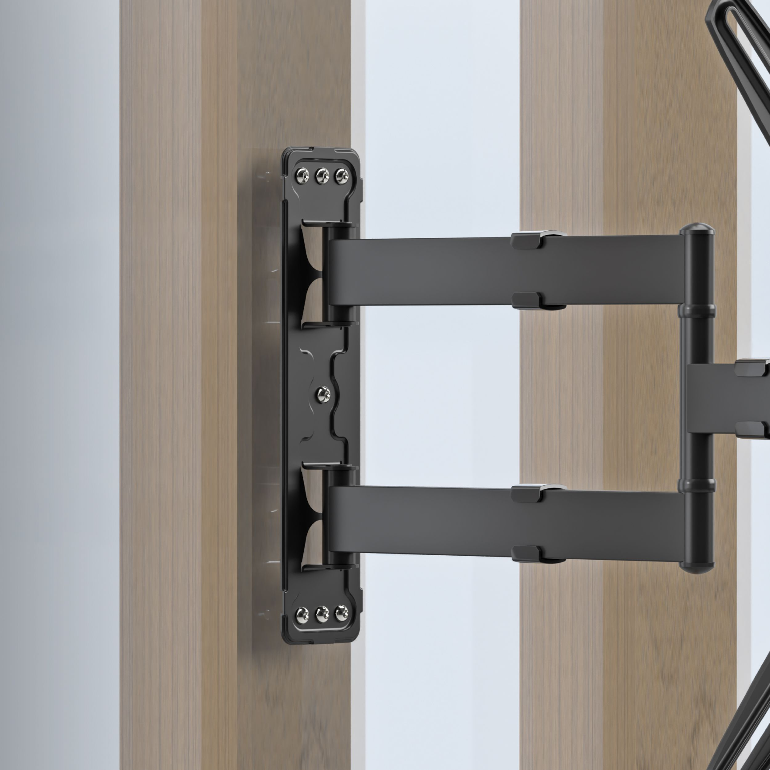 Czarny uchwyt ścienny do telewizora jest przymocowany do drewnianej ściany. Uchwyt ma regulowane ramiona i śruby.