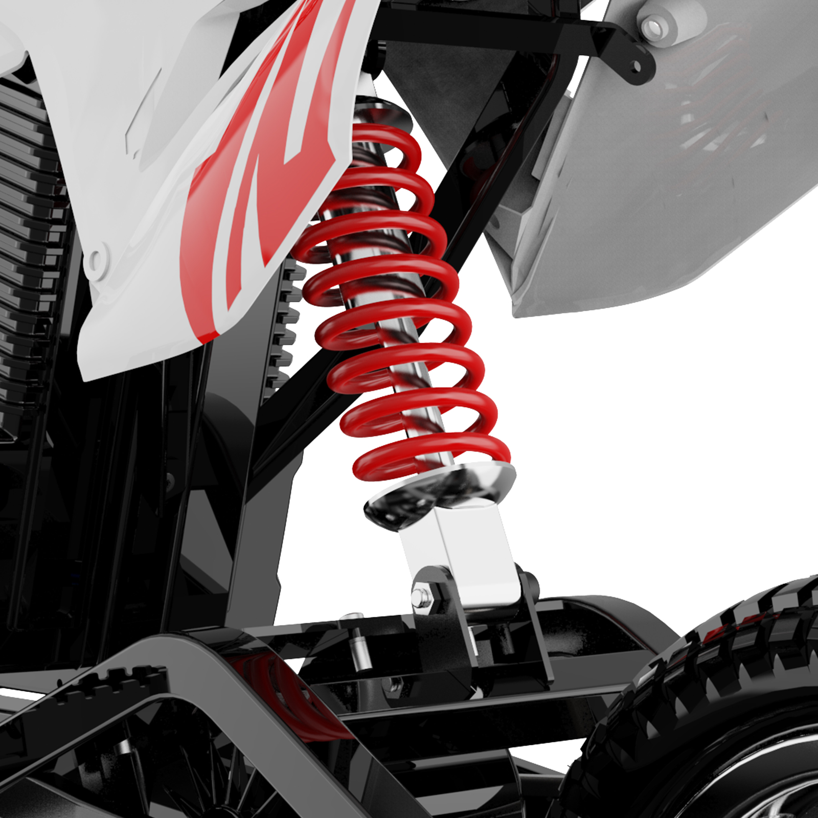 Close-up van een ATV. Rode schokdemperveer, wit en rood carrosseriepaneel, zwart frame en band zichtbaar.