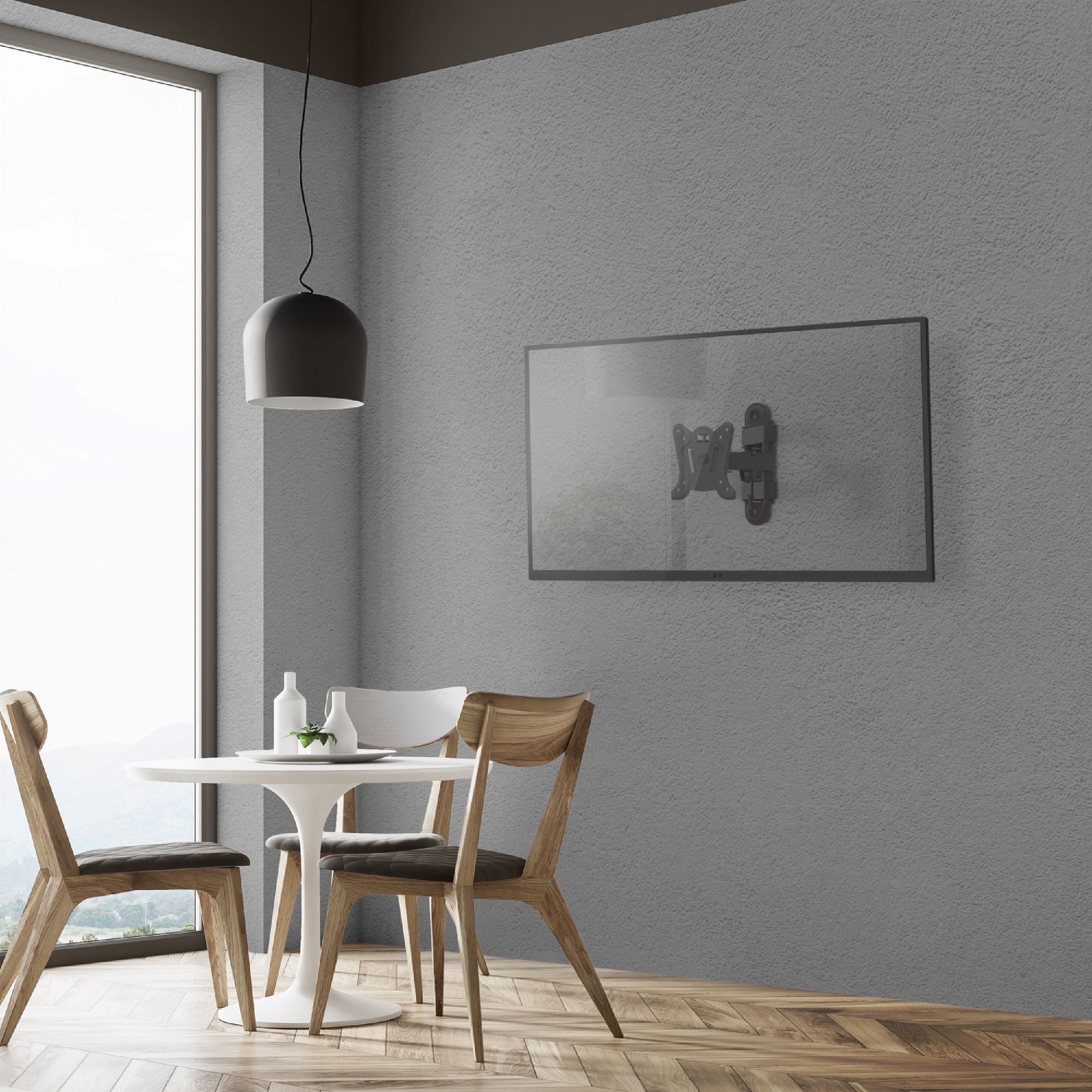 Jadalnia z białym stołem, drewnianymi krzesłami, oknem i telewizorem na szarej ścianie. Podłoga drewniana.