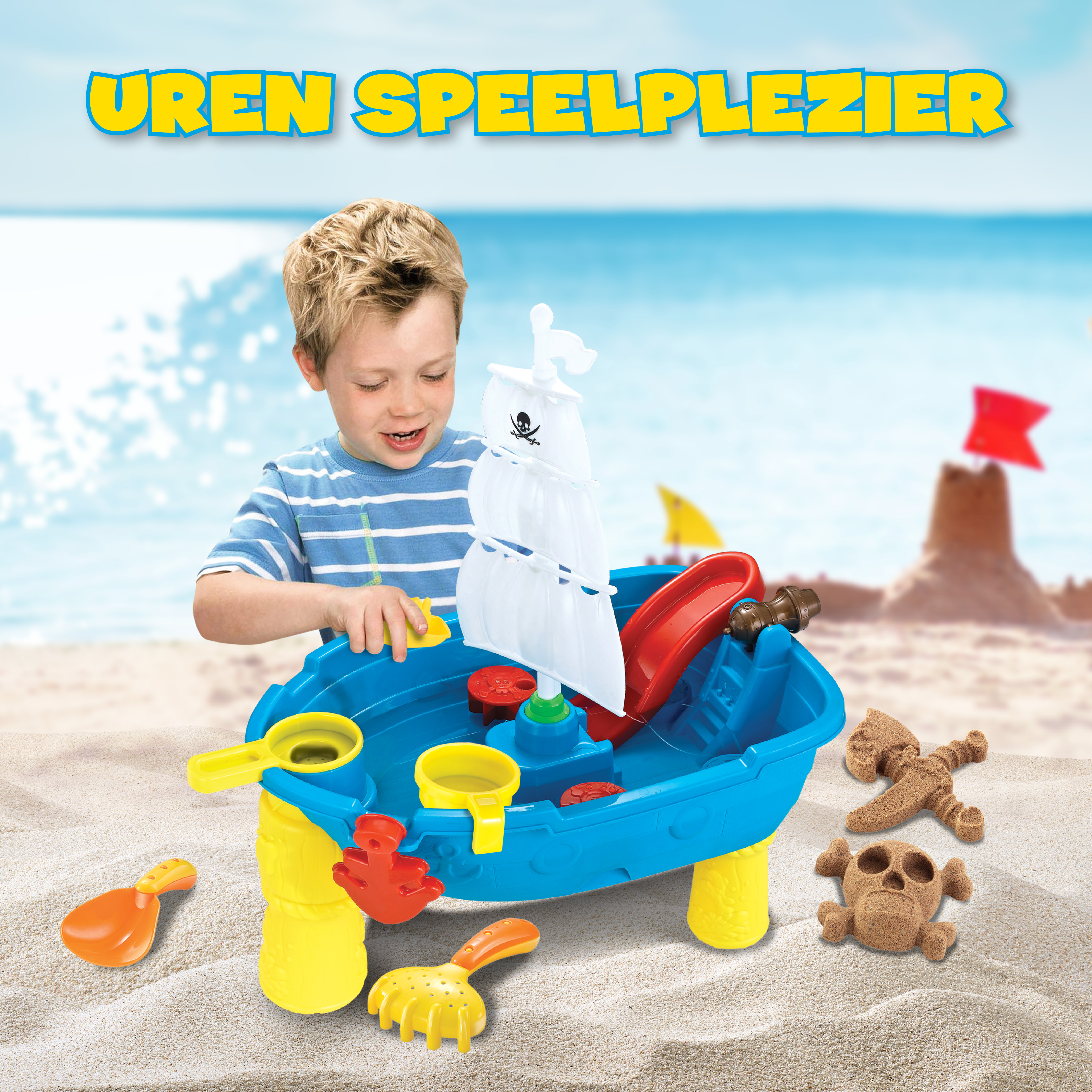 A boy plays with a blue pirate ship toy on a sandy beach. The ship has a white sail, a red slide and yellow accessories.
