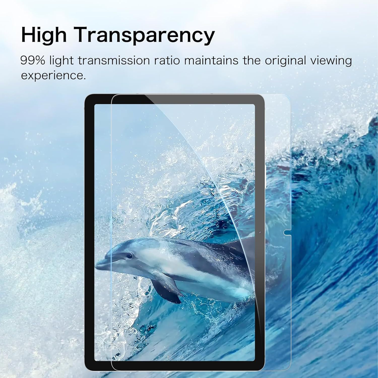 Tablet z nałożoną folią ochronną na tle delfina pływającego w błękitnej wodzie. Tekst wspomina o wysokiej przejrzystości.