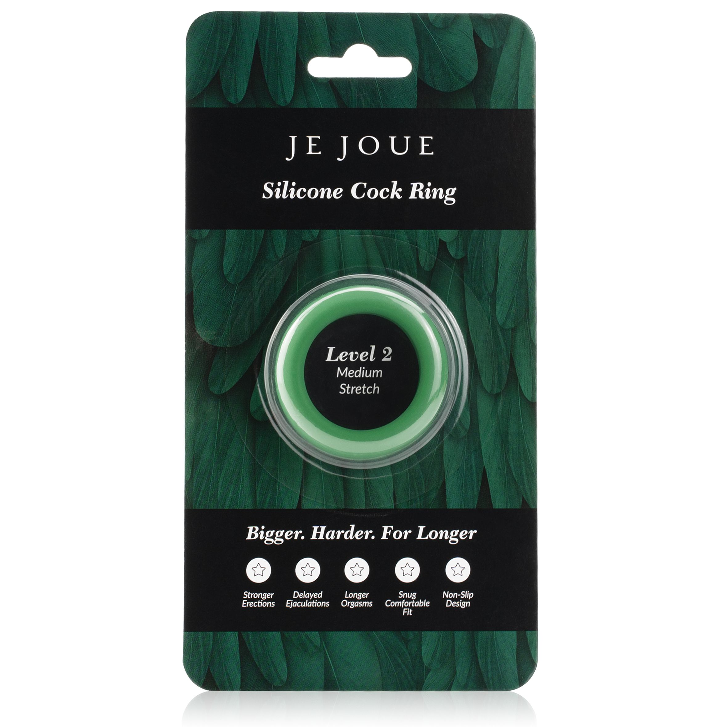 Empaque de producto para un anillo de silicona para el pene. Anillo verde visible dentro del empaque. Texto incluye 'Je Joue' y 'Nivel 2'.