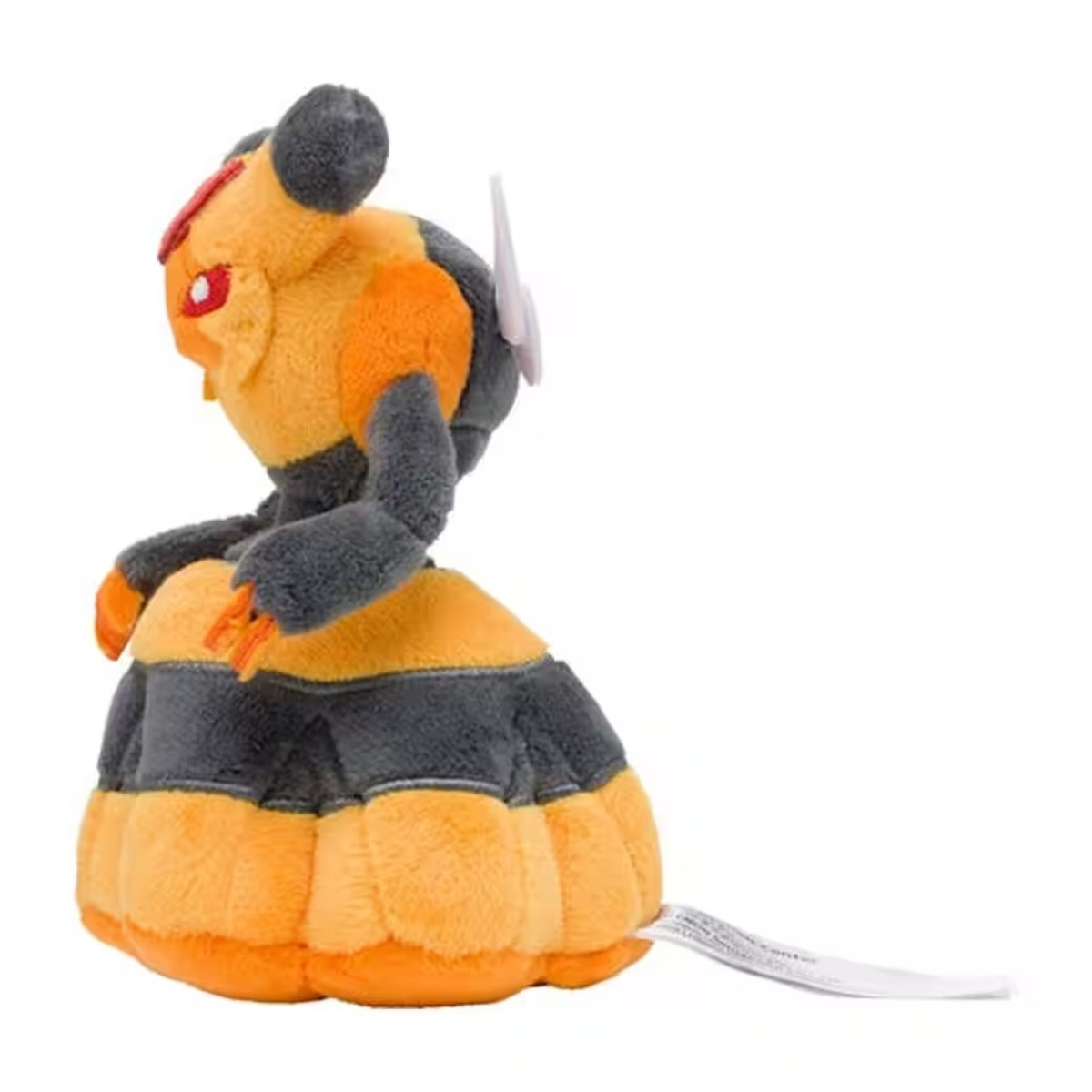 Ein Plüschtier eines bienenartigen Wesens mit orangefarbenen und schwarzen Streifen. Es hat ein weißes Etikett und befindet sich auf weißem Hintergrund.
