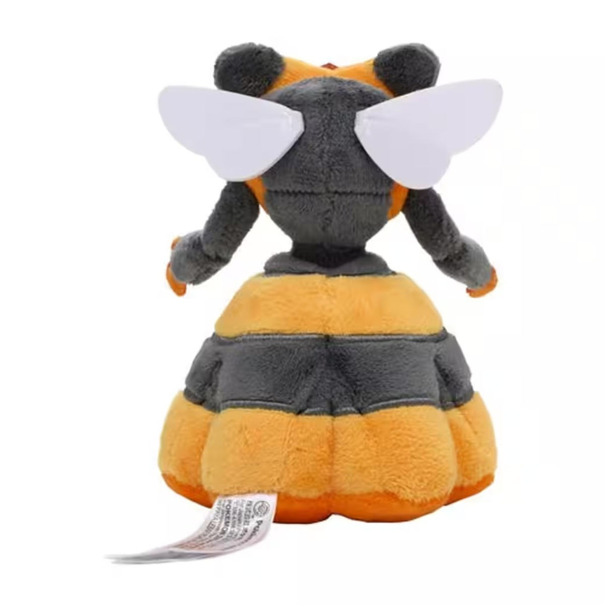 Ein Plüschtier einer bienenartigen Kreatur, von hinten betrachtet. Es hat schwarz-orange Streifen, weiße Flügel und ein Etikett.