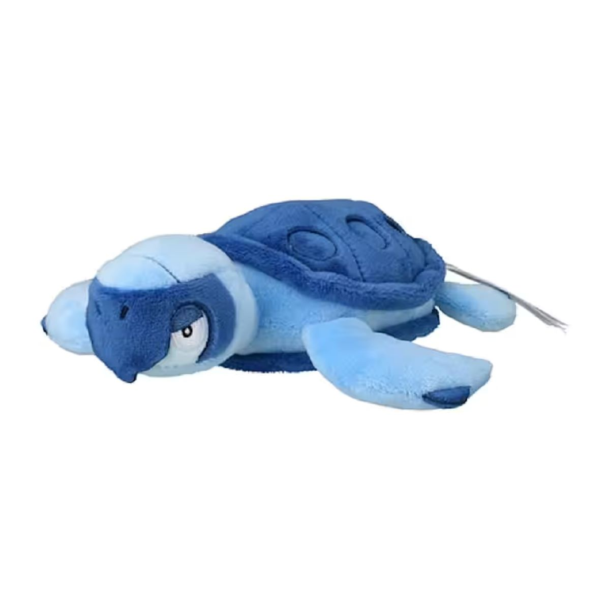 Ein blaues Plüschtierschildkröte mit hellen und dunklen Blautönen. Es hat einen Panzer, Flossen und einen Kopf. Ein Anhänger ist befestigt.