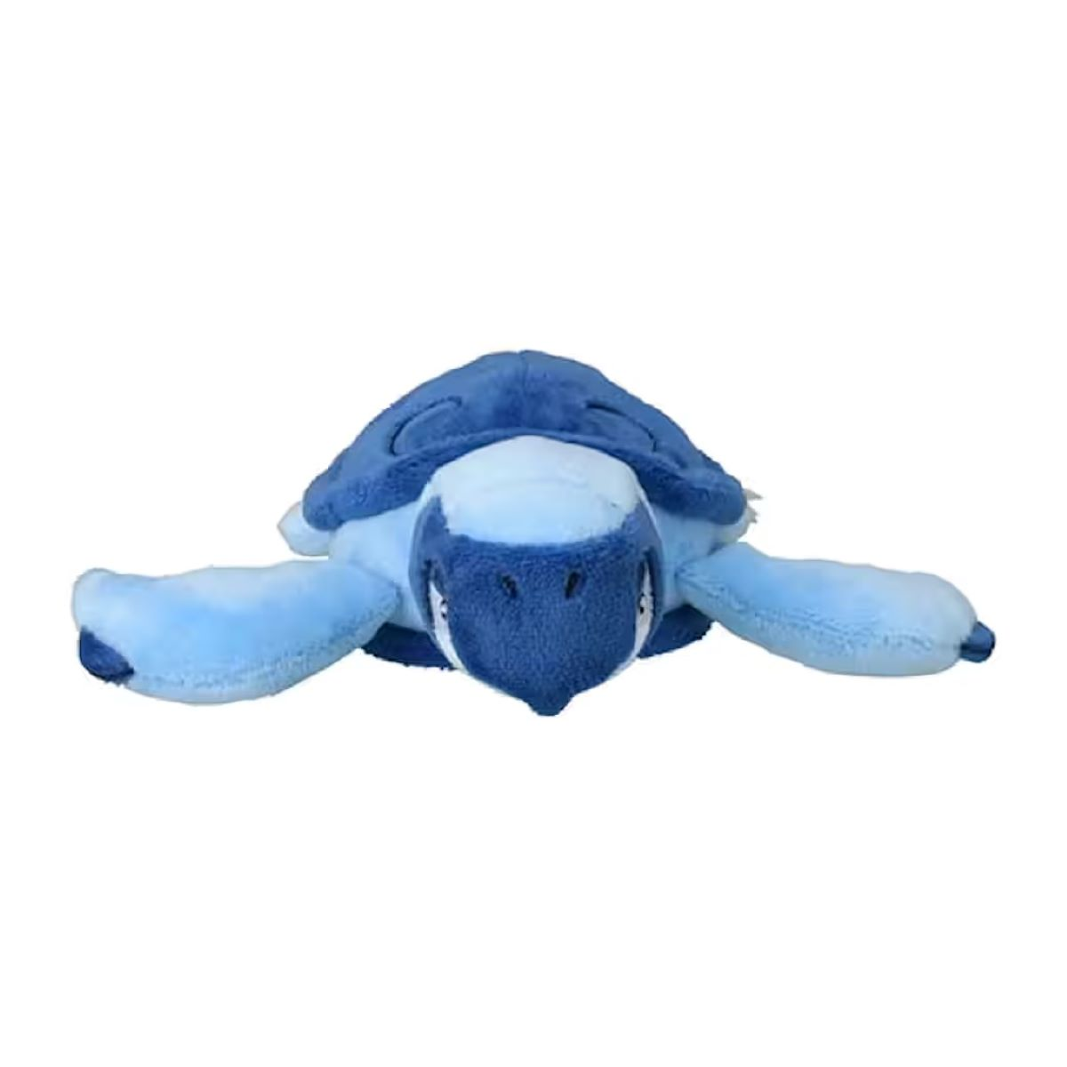 Ein blaues Plüschtier, eine Schildkröte, liegt vor weißem Hintergrund. Es hat einen dunkelblauen Panzer, einen hellblauen Kopf und Flossen.