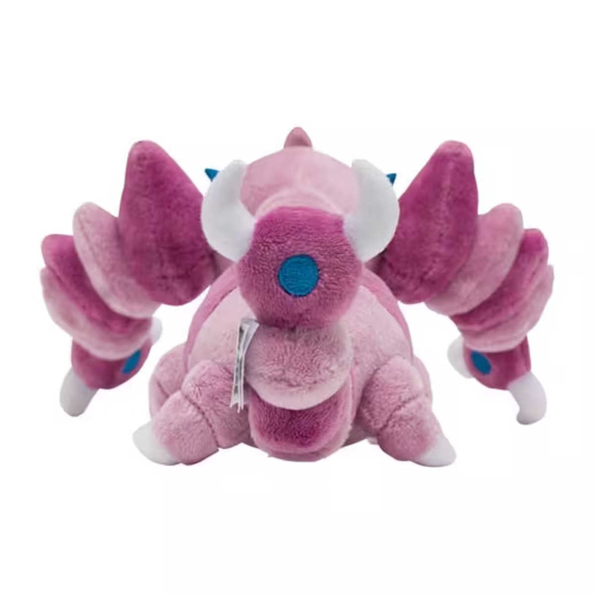 Ein rosa Plüschtier mit lila Akzenten. Es hat große, flügelartige Anhänge und weiße Hörner. Ein blauer Kreis befindet sich auf Nase und Anhängen.