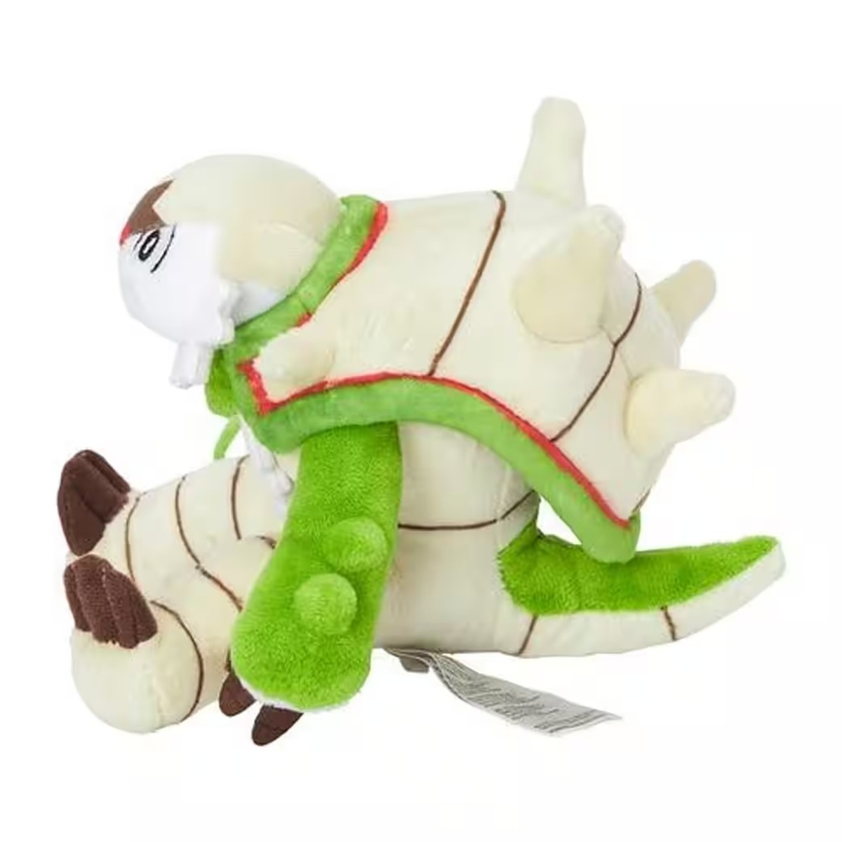 Ein Plüschtier einer Pokemon-Figur. Es hat einen weißen Körper mit braunen Linien und grünen Akzenten. Der Kopf ist weiß und die Beine sind grün.