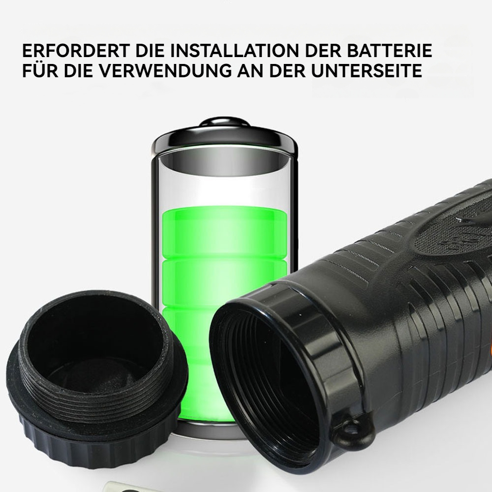 Das Bild zeigt ein zerlegtes schwarzes Gerät mit einem grünen Batteriesymbol. Teile des Geräts und eine Batterie sind sichtbar.