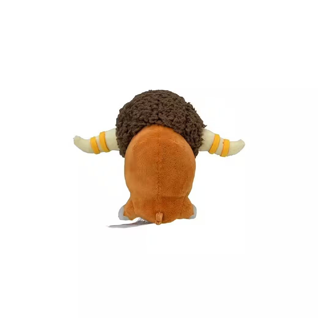 Ein Plüschtier eines Bullen von hinten. Es hat braunes Fell, einen orangefarbenen Körper, cremefarbene Hörner mit gelben Streifen und weiße Füße.