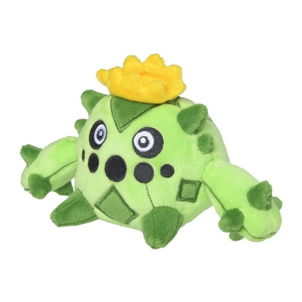Ein grünes Plüschtier, das einem Kaktus ähnelt und oben eine gelbe Blume hat. Es hat schwarze Augen, schwarze Flecken und weiche grüne Arme.