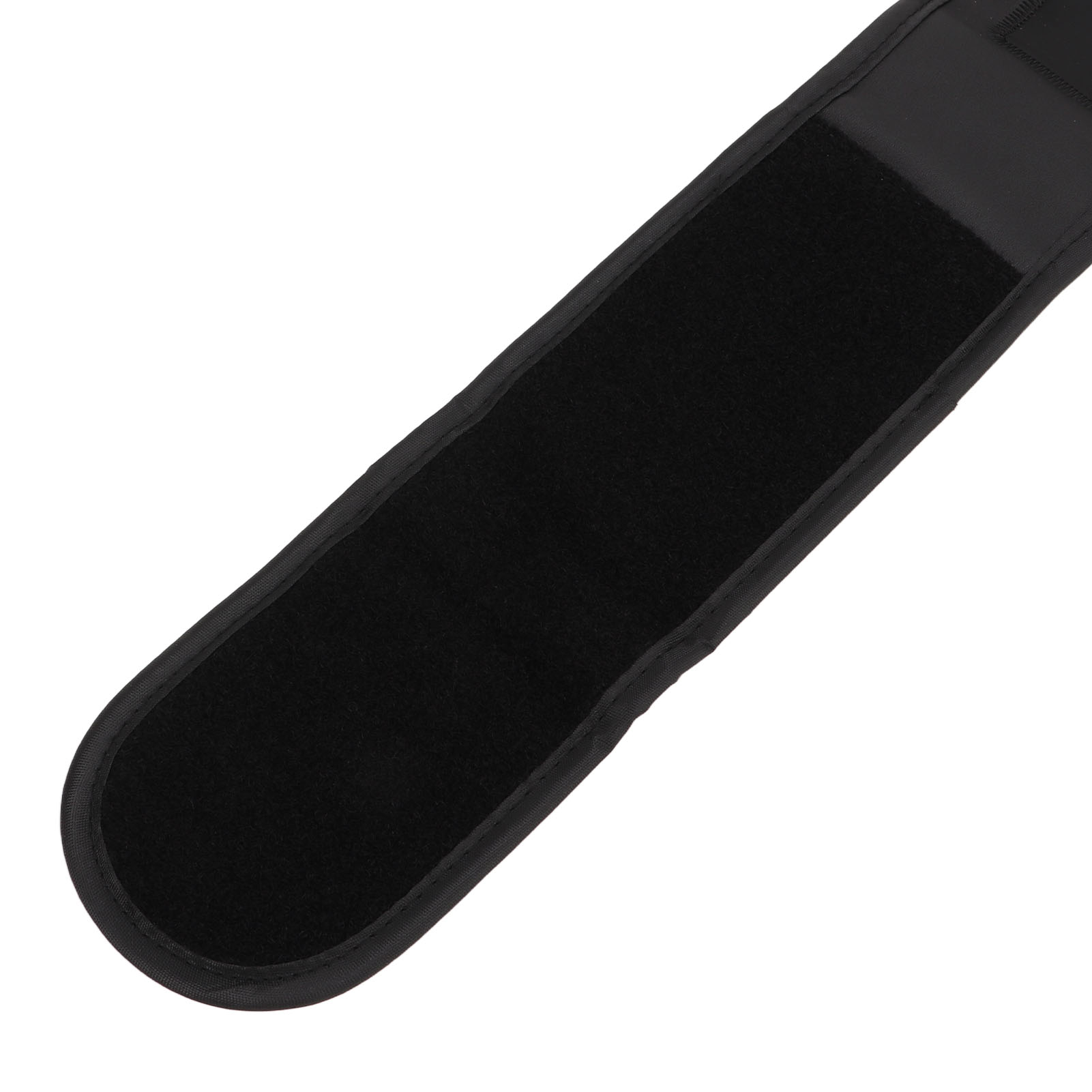 Eine schwarze Handgelenkstütze. Sie hat eine weiche, flauschige schwarze Innenfläche und eine glatte schwarze Außenfläche.