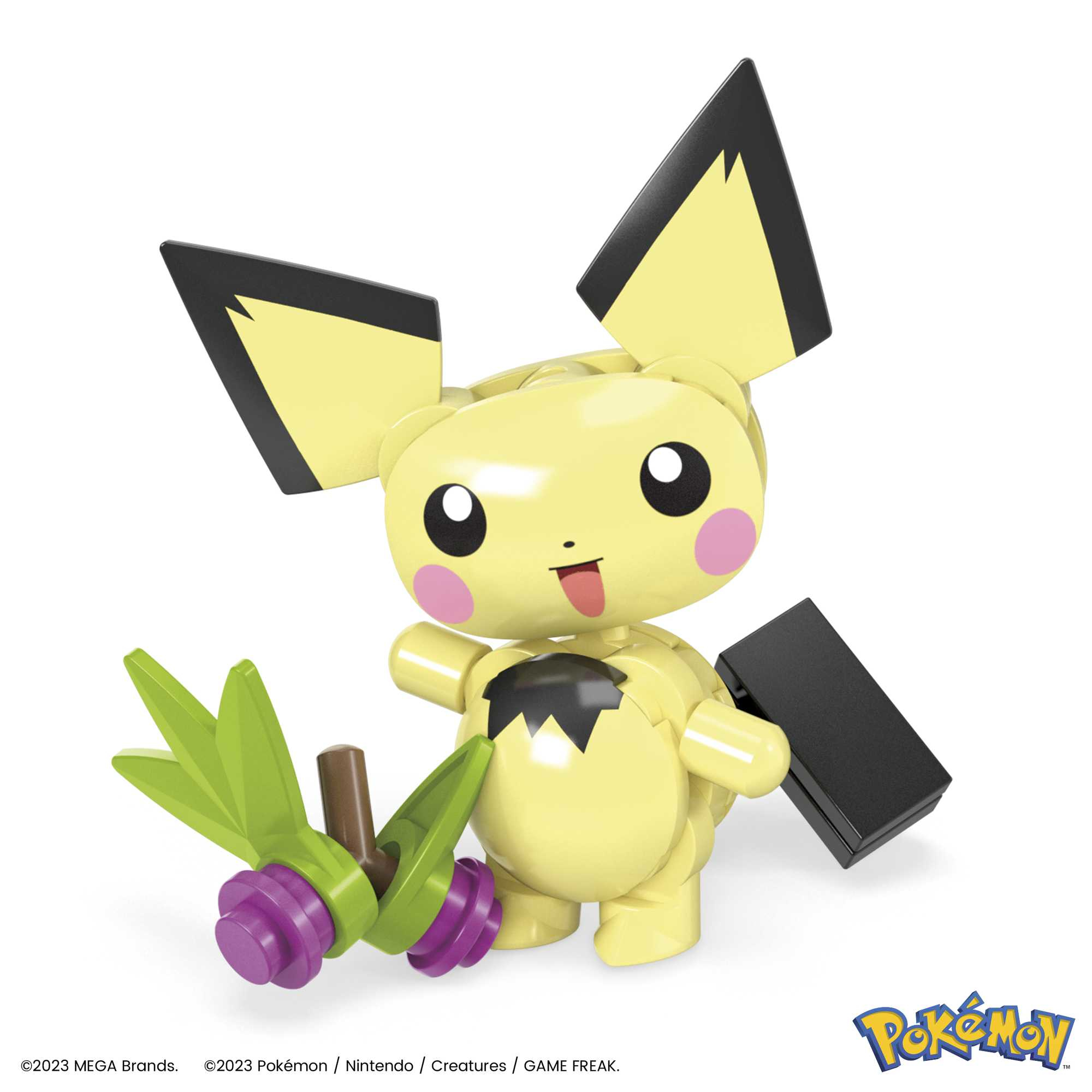 Una figura gialla simile a Pikachu con orecchie nere, guance rosa e lingua di fuori. Tiene un oggetto verde e viola.