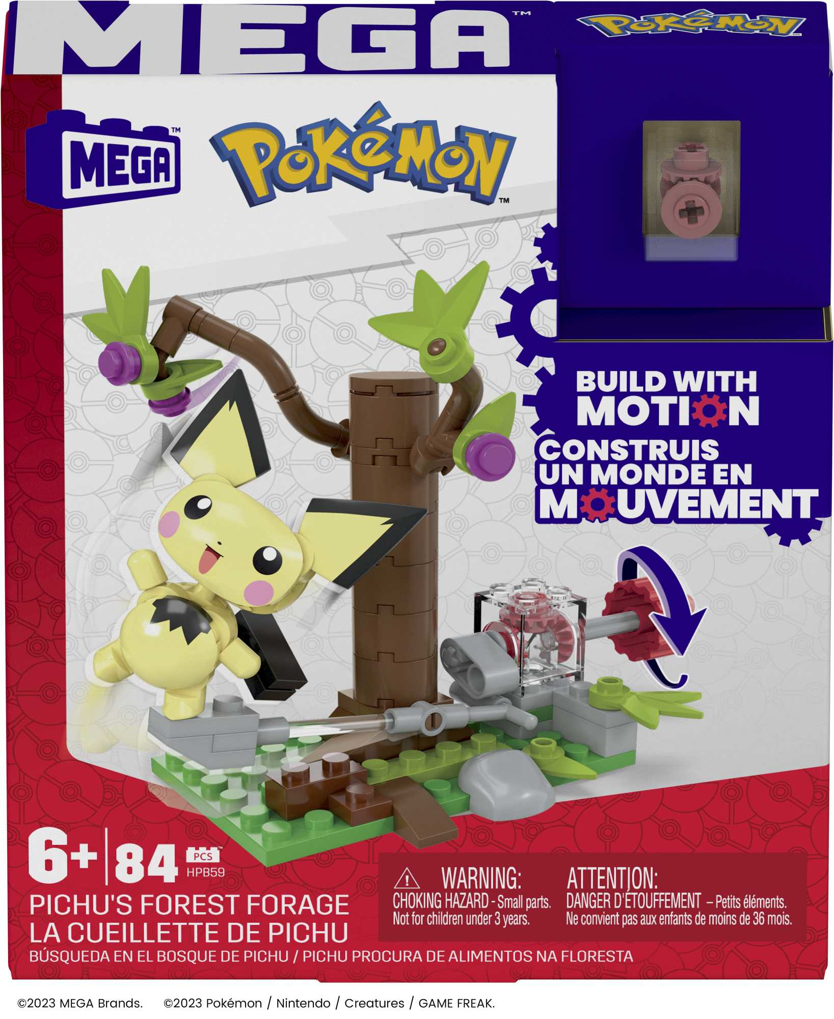 Scatola del set Mega Pokémon. Presenta un personaggio di Pikachu, un albero costruibile e altri elementi di costruzione. La scatola è rossa e blu.
