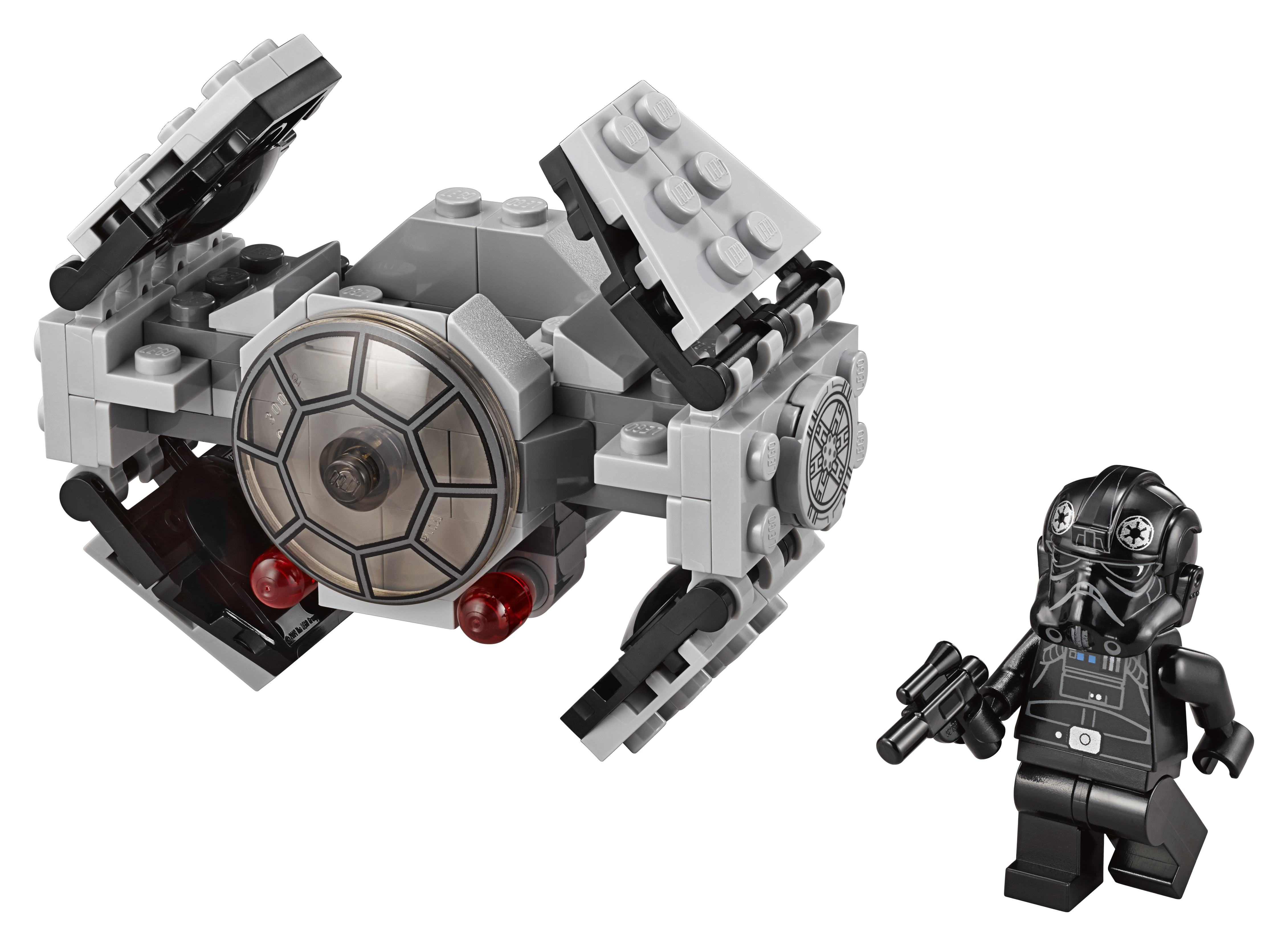 Un caccia TIE Lego grigio e un personaggio Lego nero con una pistola nera. Entrambi su sfondo bianco.