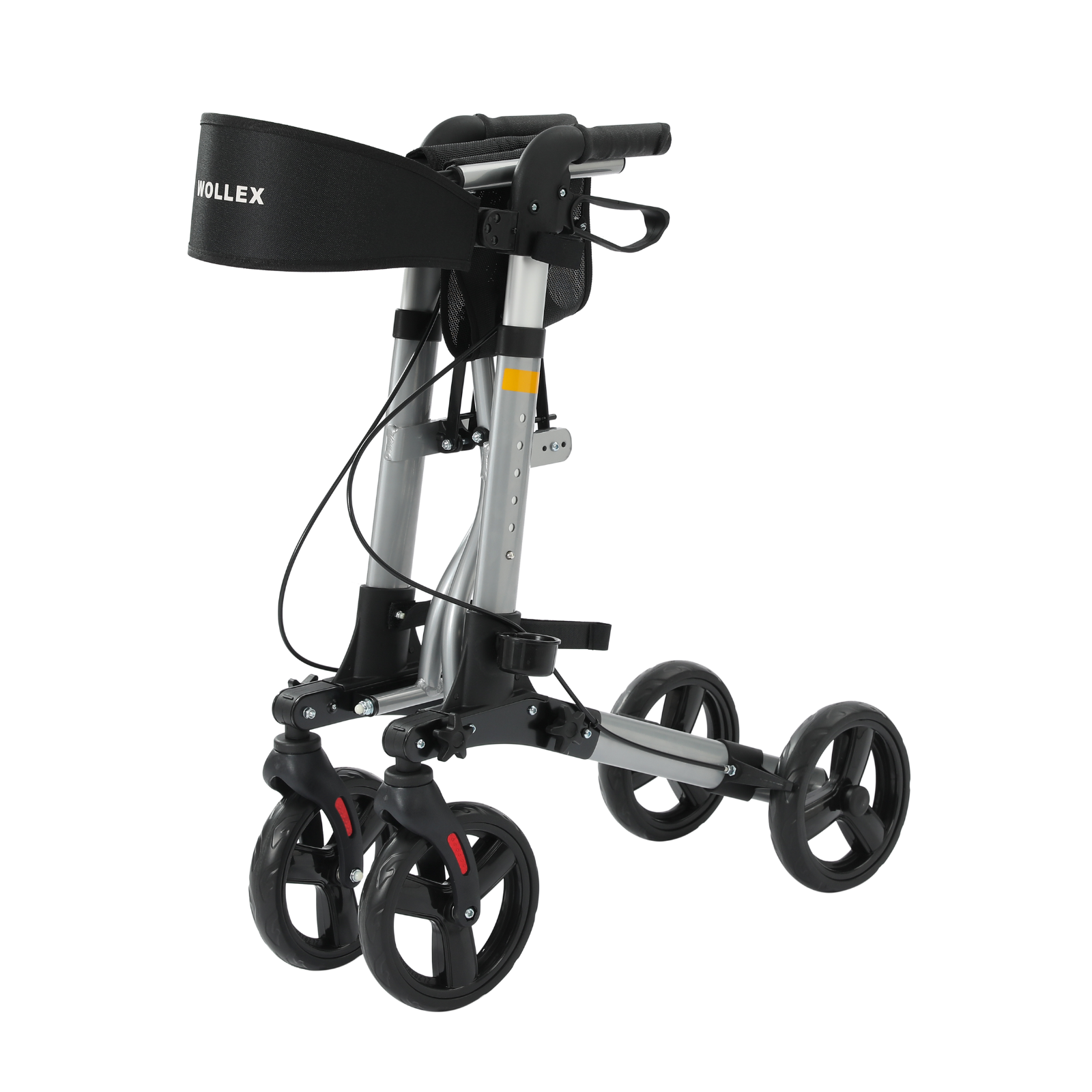 Ein silber-schwarzer Rollator mit vier Rädern. Er hat einen gepolsterten schwarzen Sitz und eine schwarze Tasche. Der Markenname Wollex ist sichtbar.