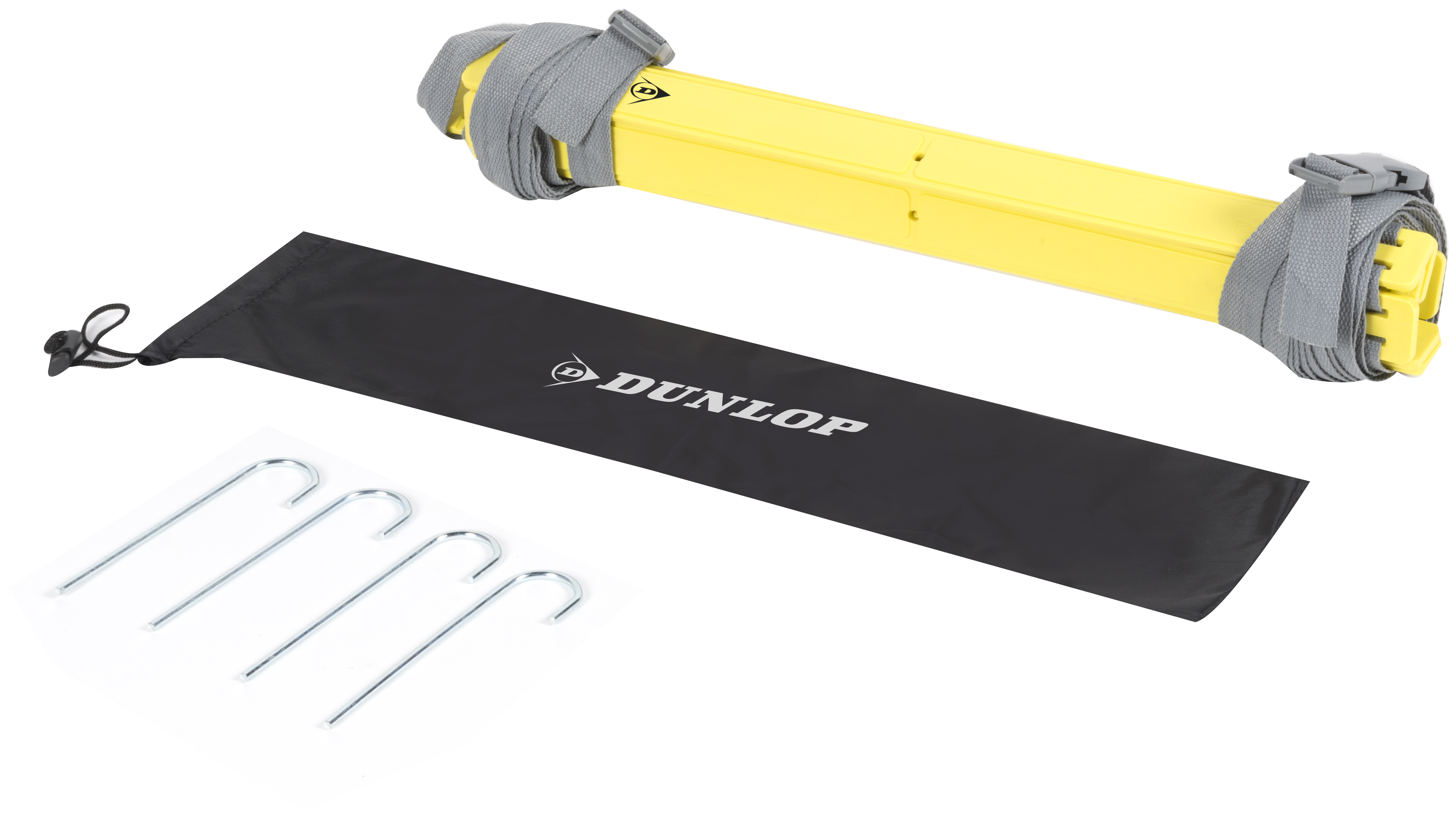 A yellow training aid is rolled up and strapped. A black bag with the Dunlop logo and metal stakes are also visible.