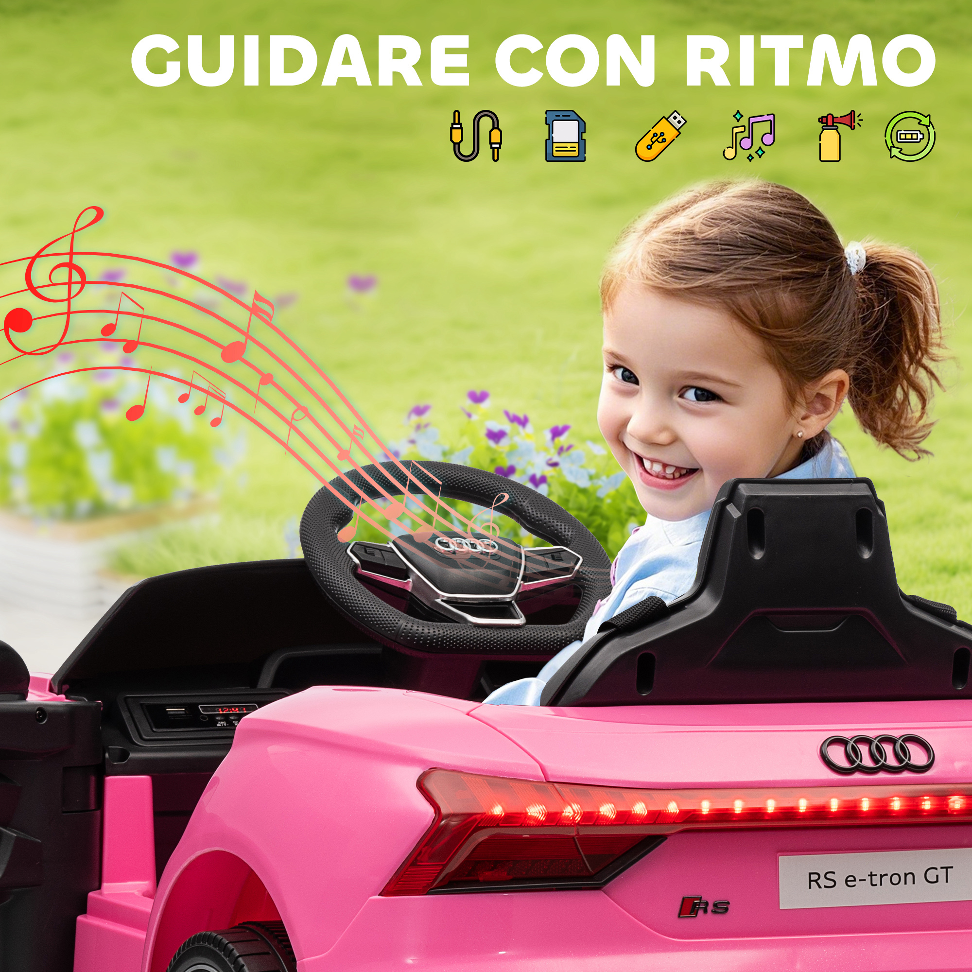 Una bambina sorride mentre guida un'auto giocattolo rosa. Note musicali fluttuano nell'aria. L'auto ha il logo Audi.