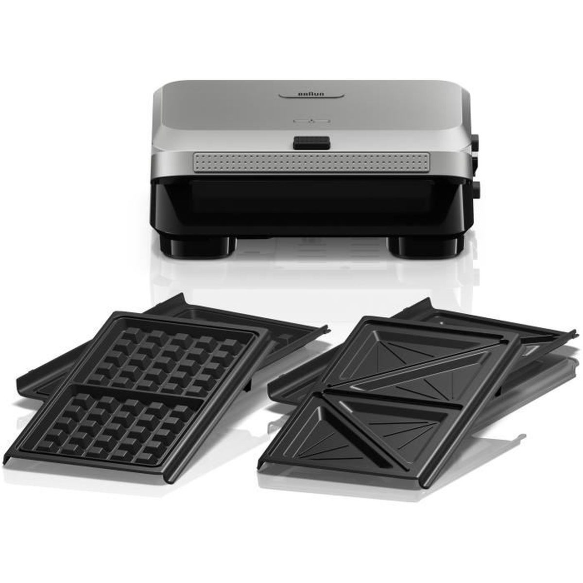 A silver and black Braun waffle maker with two sets of plates. One set for waffles and one for sandwiches.