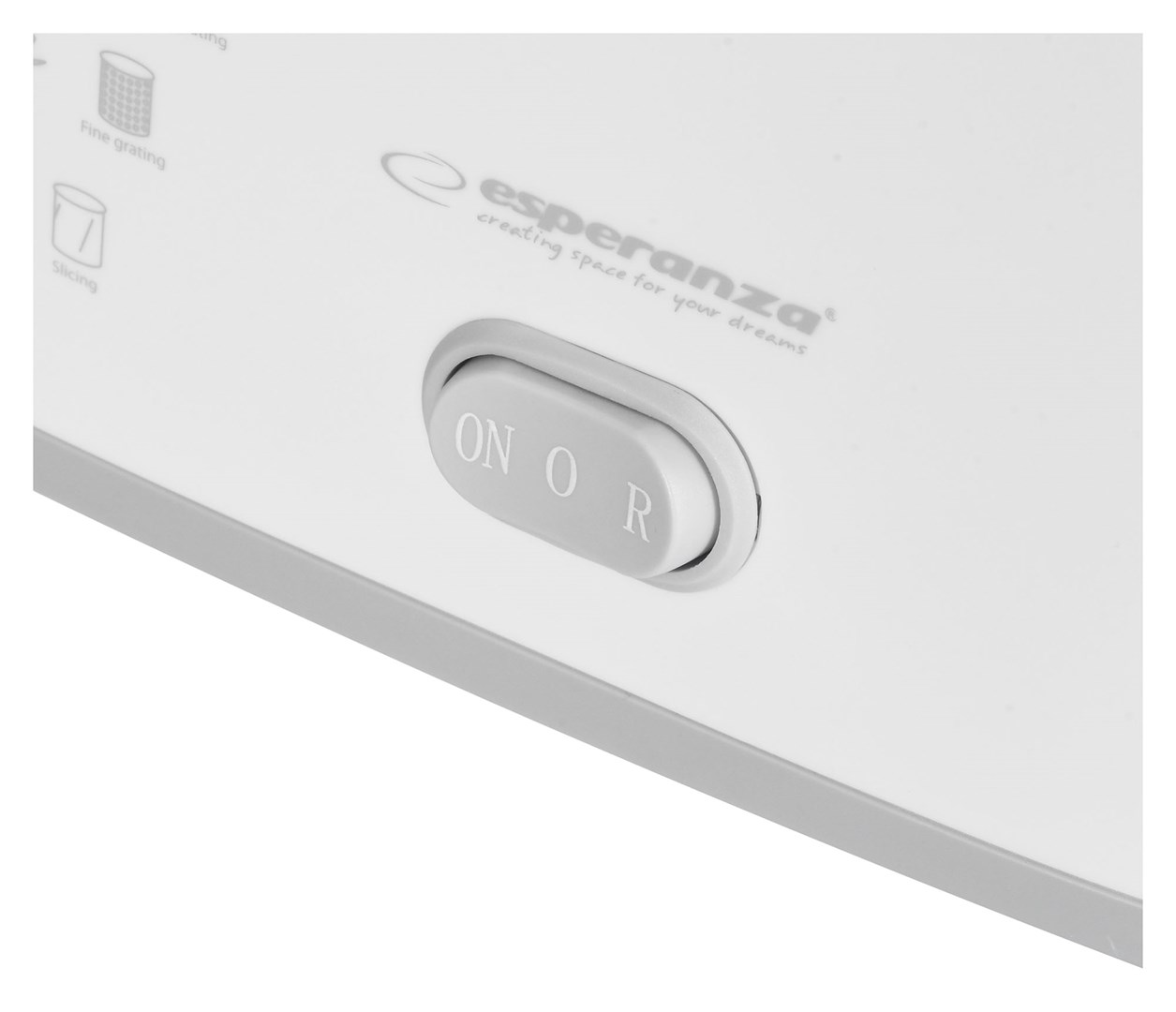 Zbliżenie białego urządzenia kuchennego z szarym włącznikiem/wyłącznikiem. Widoczne słowo 'esperanza'.