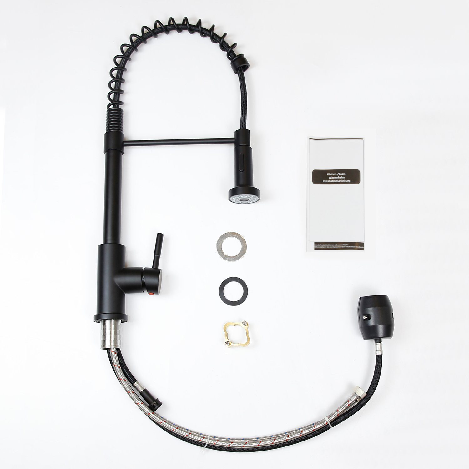 Czarna bateria kuchenna ze sprężyną spiralną, wraz z innymi częściami i instrukcją obsługi, ułożone na białej powierzchni.