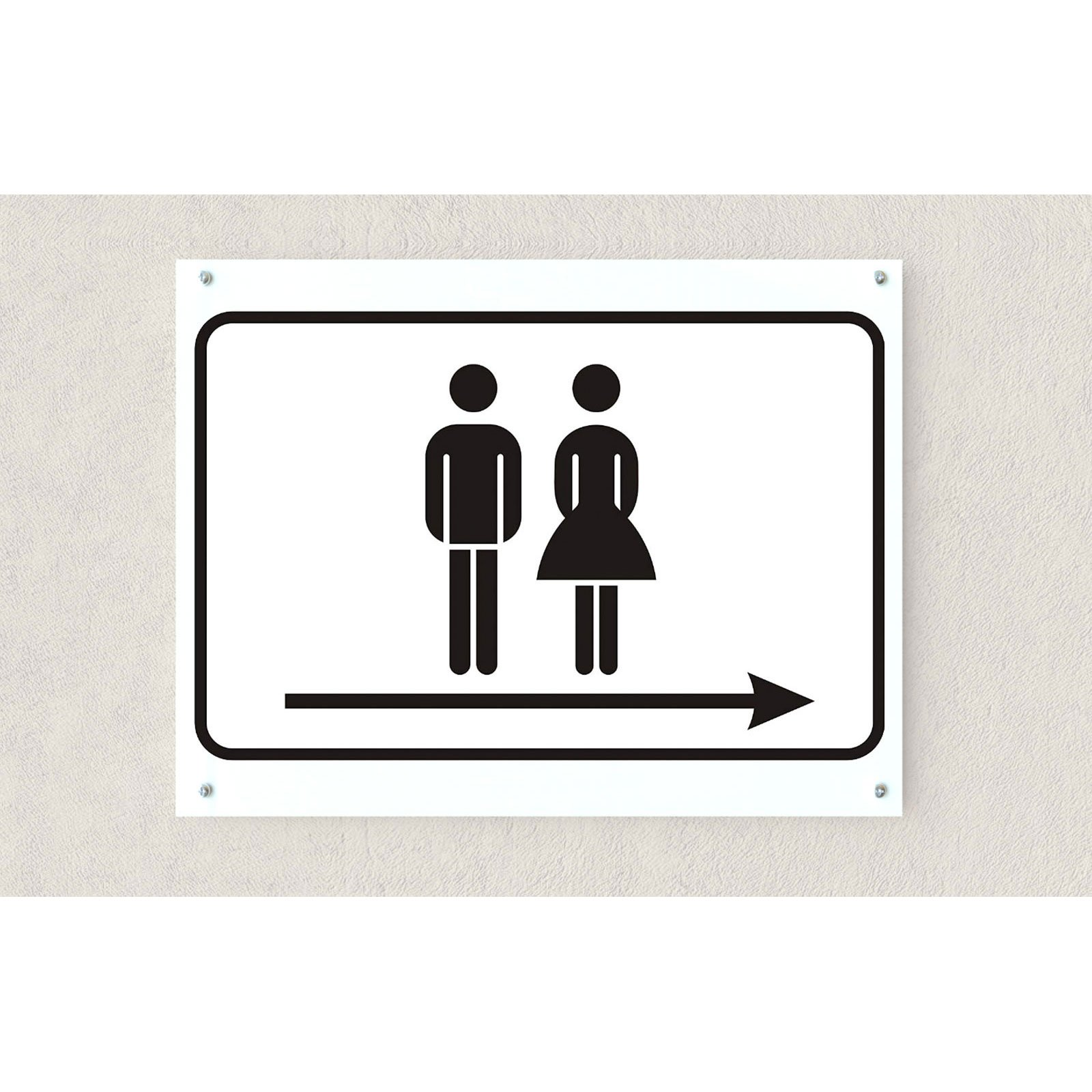 Ein Toilettenschild mit männlichen und weiblichen Figuren und einem Pfeil, der die Richtung angibt.