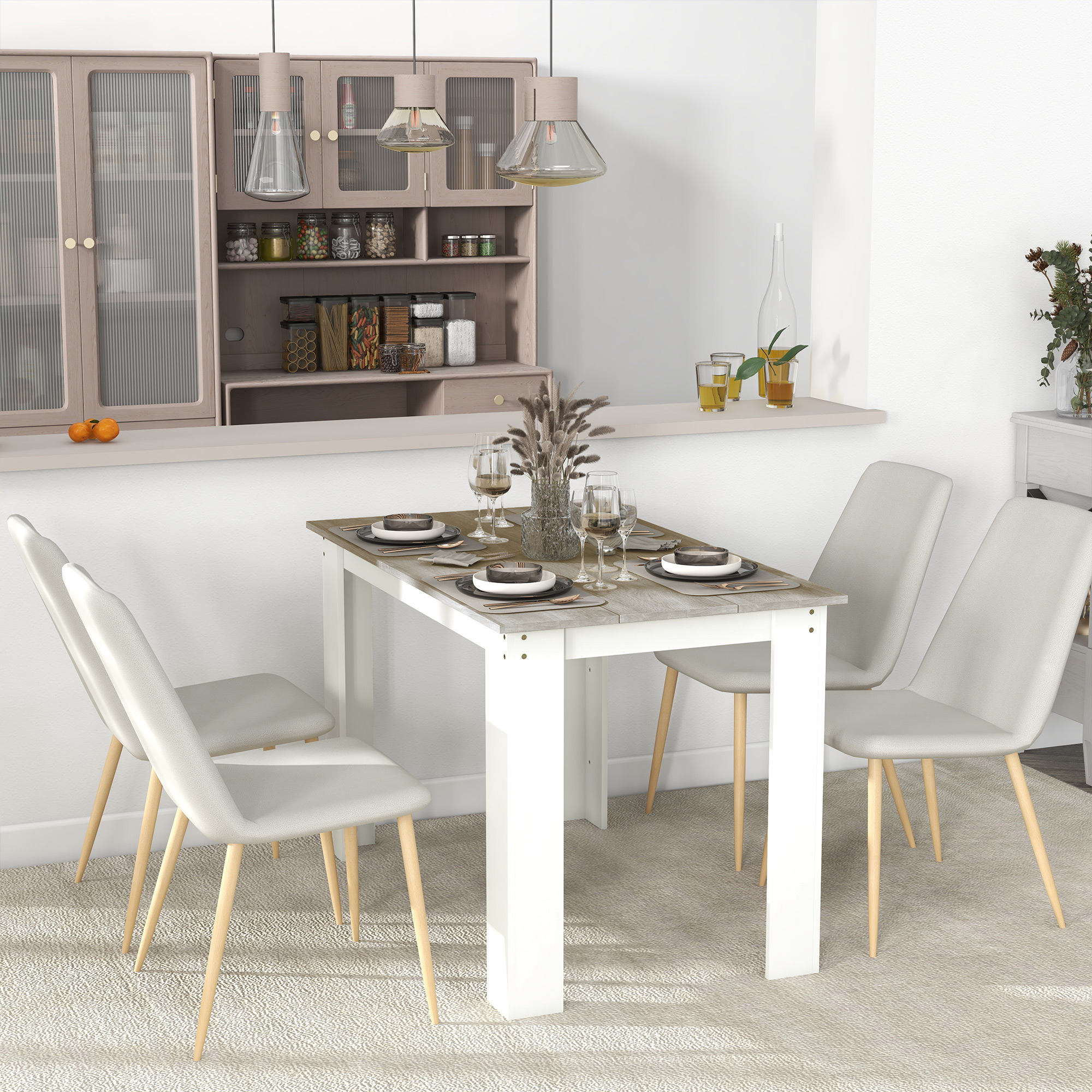 Una sala da pranzo con tavolo per quattro. Pensili sopra, sedie intorno al tavolo e tappeto sul pavimento.