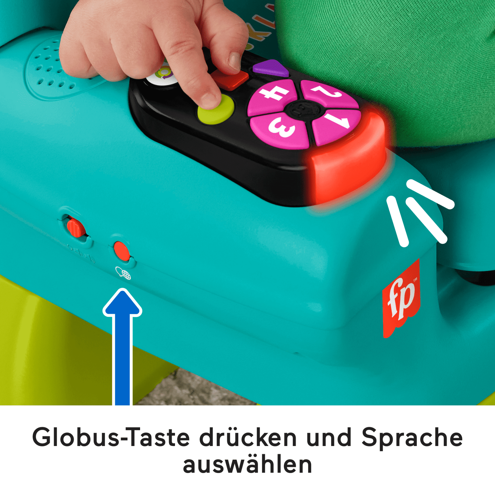 Ręka dziecka naciska zielony przycisk na zabawce. Widoczne są cyfry i czerwone światło. Obecne są kolory zielony i turkusowy.