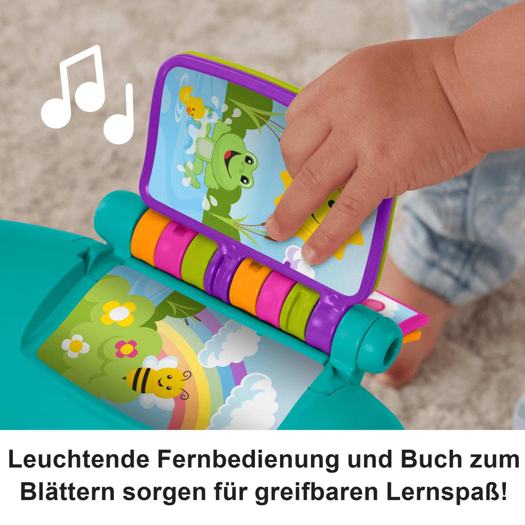 Ręka dziecka wchodzi w interakcję z kolorową książeczką z zabawkami przedstawiającą żabę, pszczołę i tęczę. Nutki pojawiają się nad zabawką.