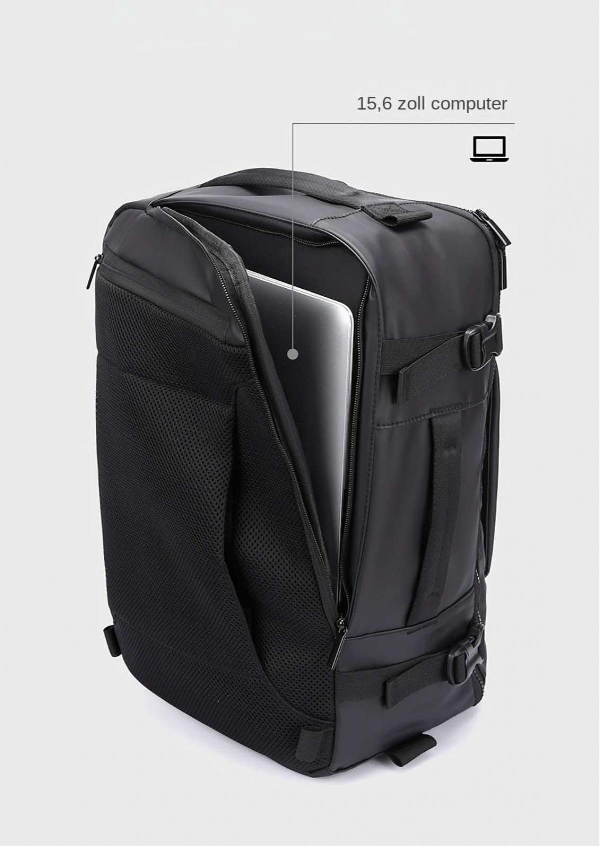 Ein schwarzer Rucksack ist geöffnet und zeigt einen Laptop. Der Text deutet darauf hin, dass er für einen 15,6-Zoll-Laptop geeignet ist.