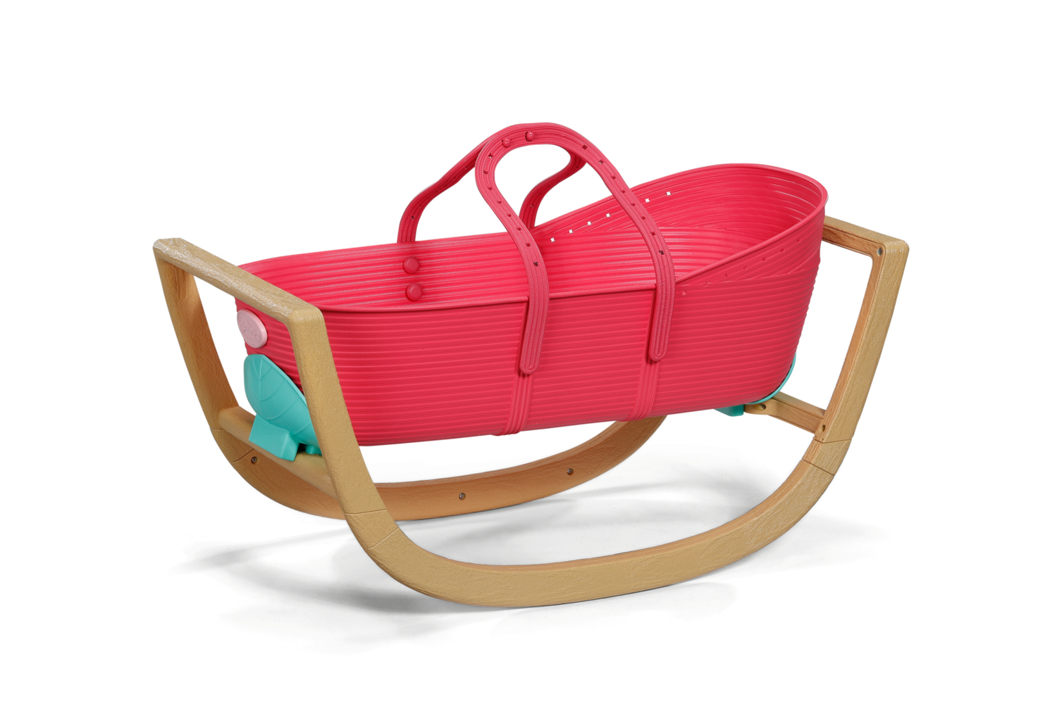 Czerwony kosz dla dziecka z uchwytami, umieszczony na drewnianej podstawie do bujania. Kosz ma turkusowe i różowe akcenty.