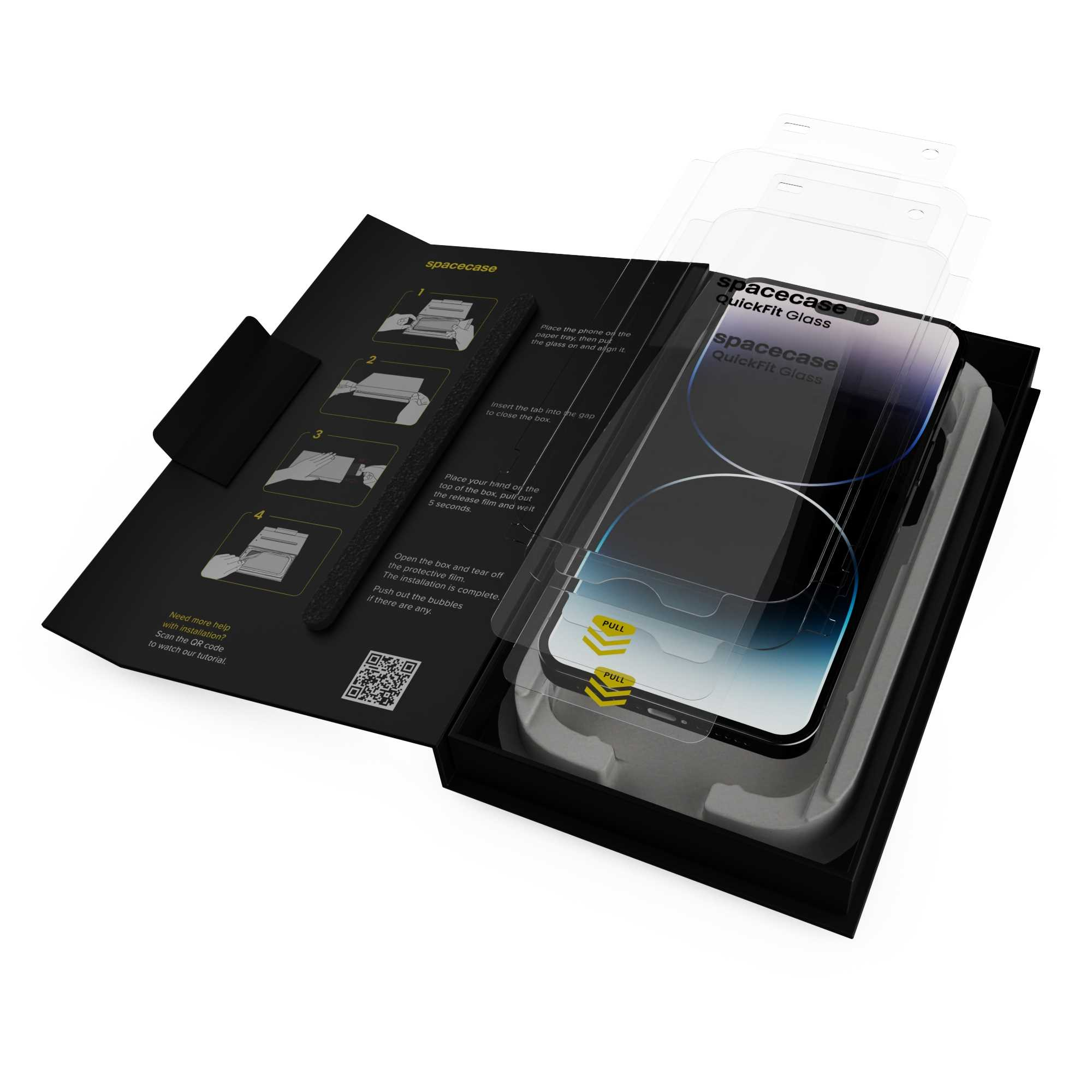 Zestaw ochronny ekranu telefonu. Pudełko jest otwarte, ukazując szkło i instrukcje. Ochraniacz jest oznaczony jako spacecase quickfit glass.