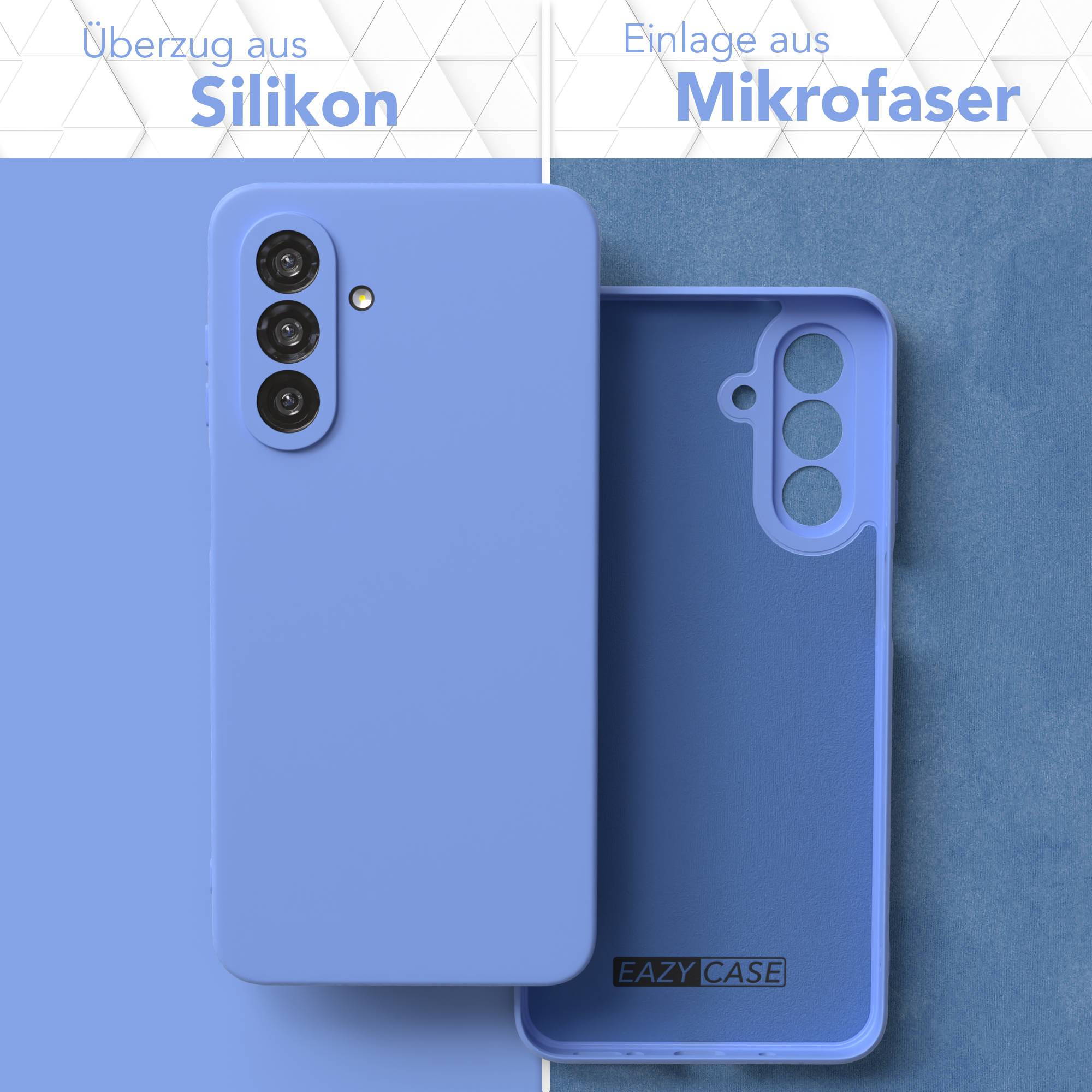 Eine blaue Handyhülle, geöffnet, um die Innenseite zu zeigen, mit Text, der darauf hinweist, dass sie aus Silikon und Mikrofaser besteht.