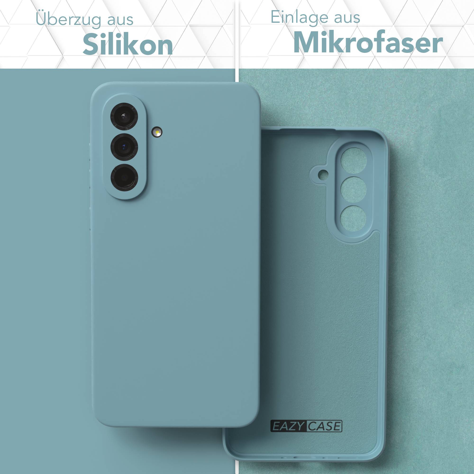 Gezeigt wird eine Handyhülle mit Silikonhülle und Mikrofaser-Innenseite. Die Hülle ist hellblau. Die Marke ist EAZY CASE.