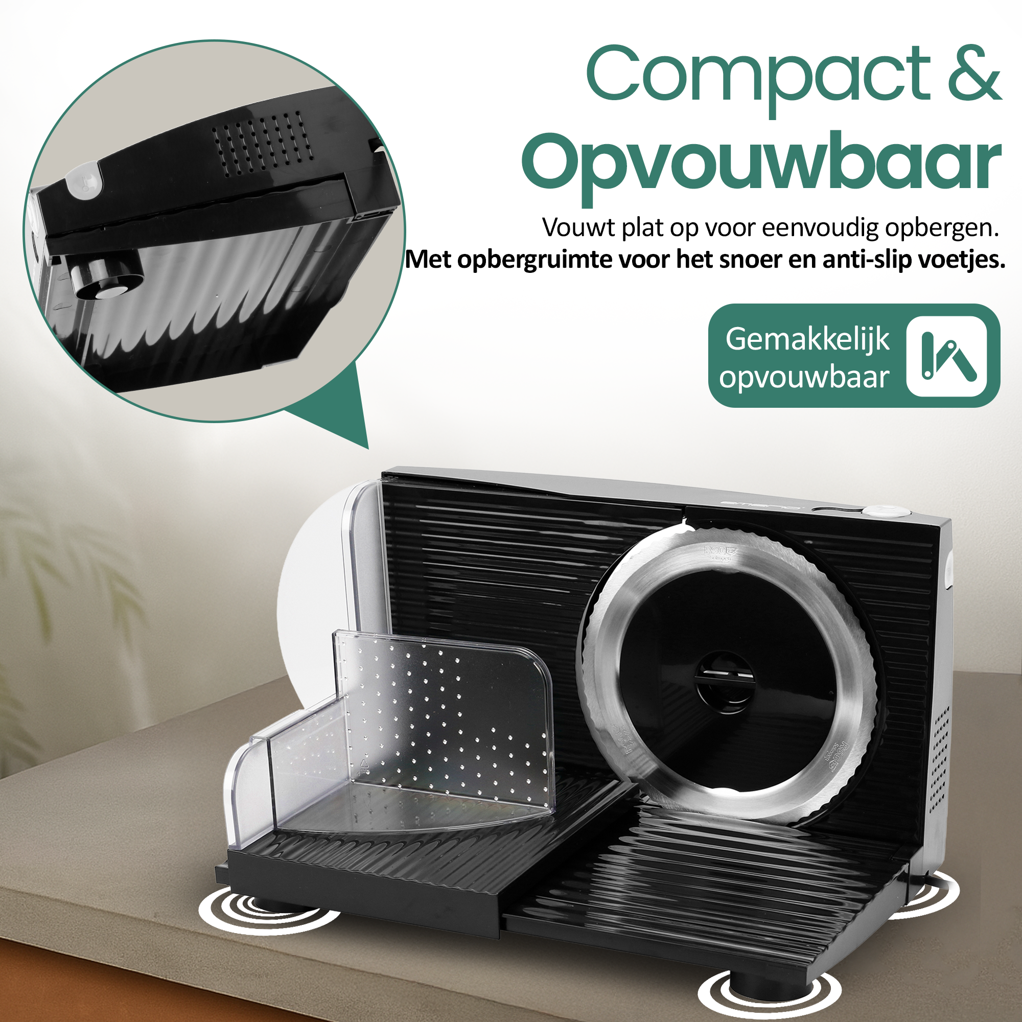 Czarna i srebrna składana krajalnica z dużym ostrzem. Posiada przezroczysty plastikowy prowadnik do żywności.